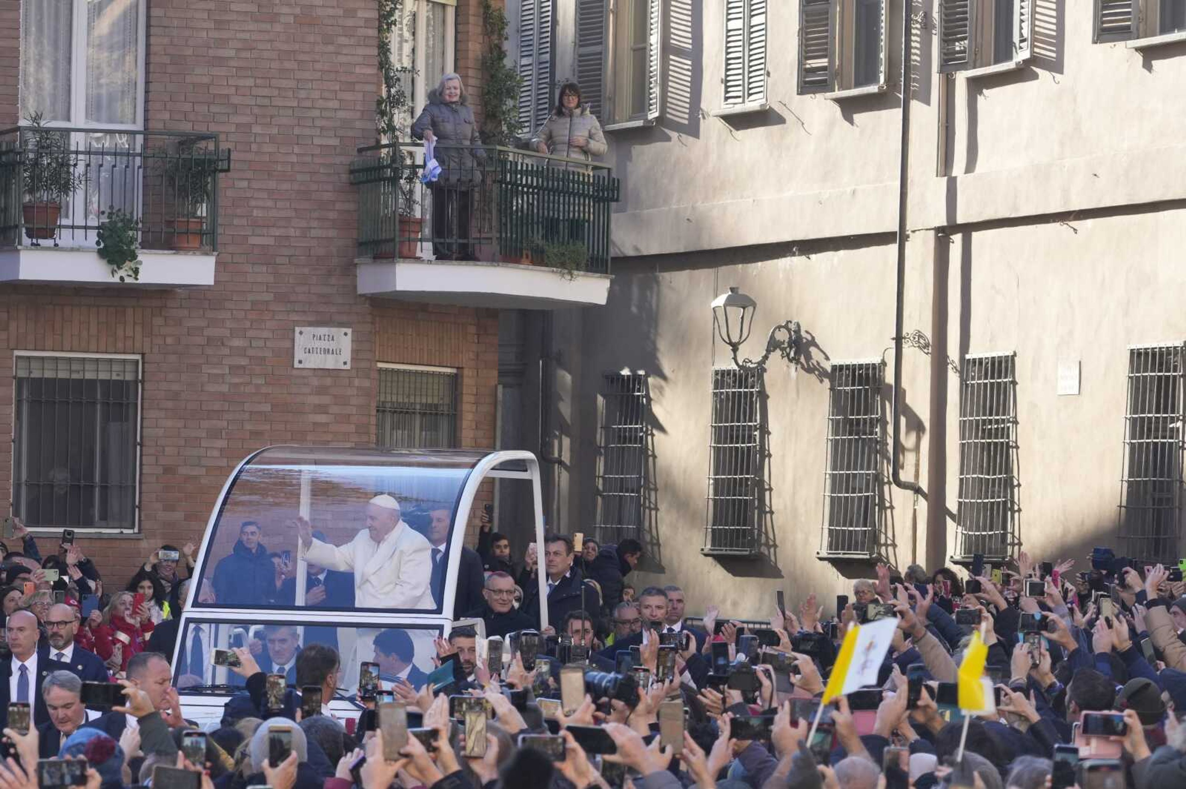 Pope Francis arrives to preside over the holy Mass in the Cathedral of Asti on Sunday in northern Italy to meet the diocesan community from which his parents had left to emigrate to Argentina and the young people from all over the region on the occasion of the XXXVII World Youth Day.