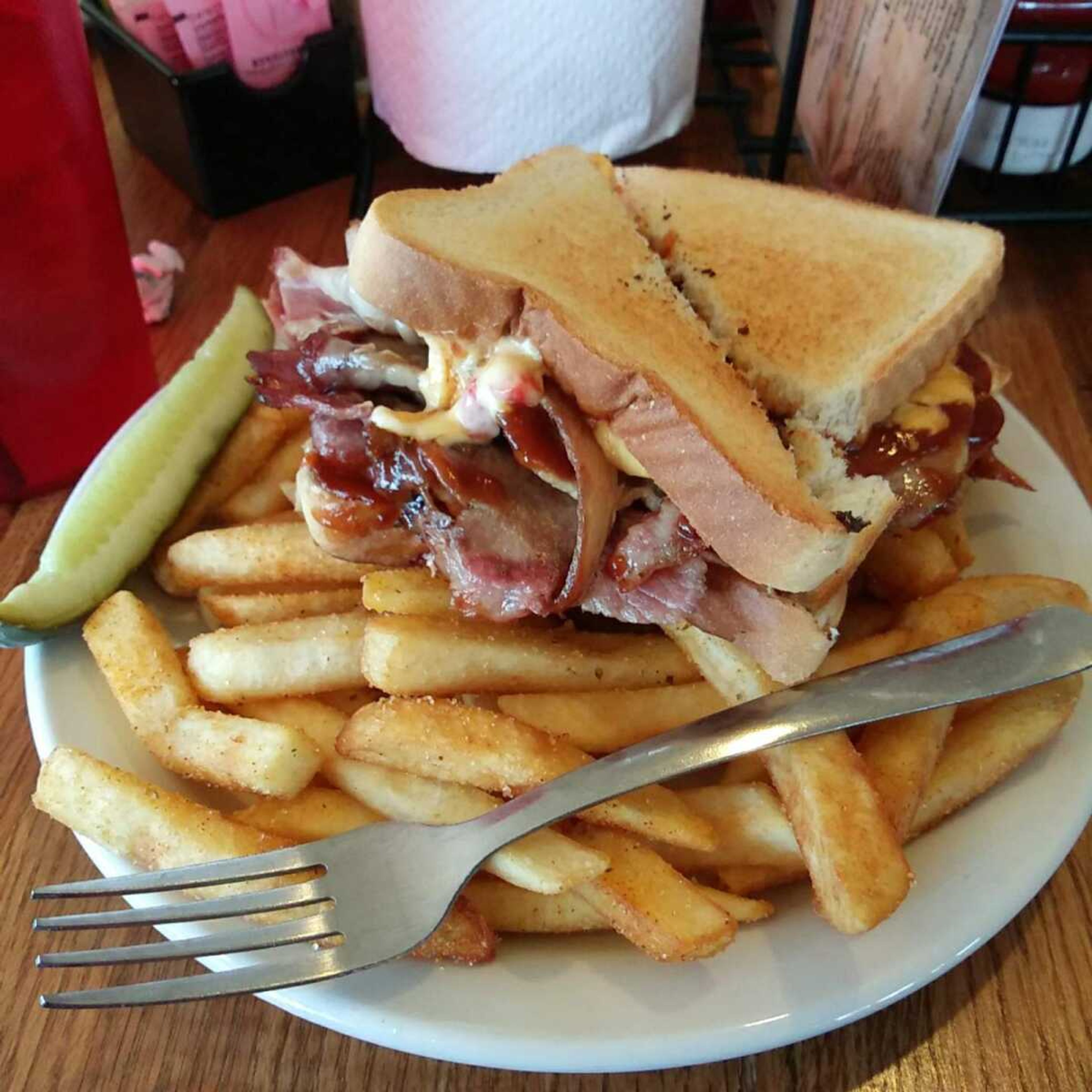 The Pilot House Jumbo Combo, a gloriously messy BBQ sandwich, smoke and bliss in every bite.