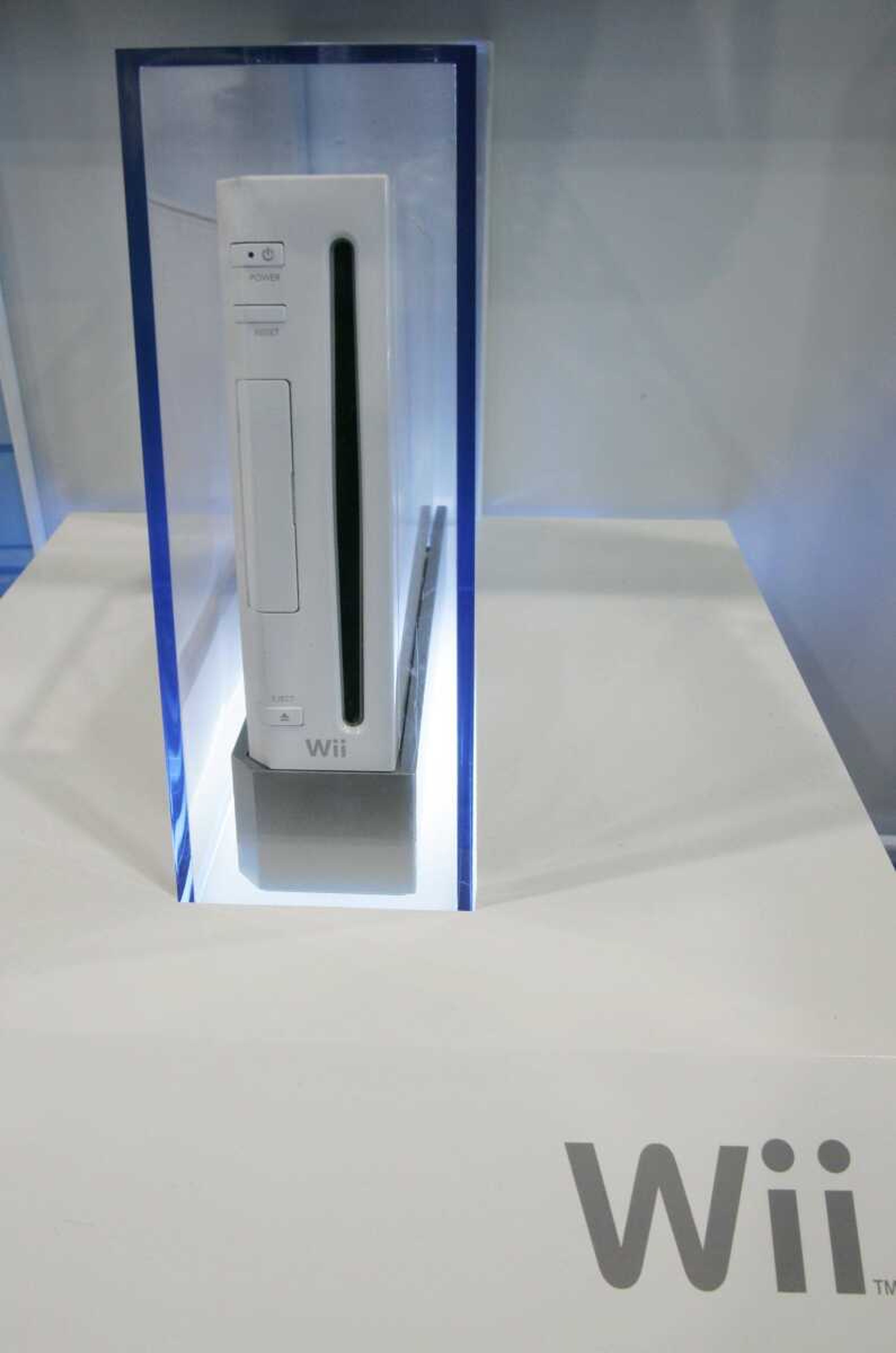 A Nintendo Wii game console was on display Tuesday in a case at Best Buy in Mountain View, Calif. By attracting traditional and nontraditional gamers alike, the Wii has maintained strong sales for its first year. (Paul Sakuma ~ Associated Press)