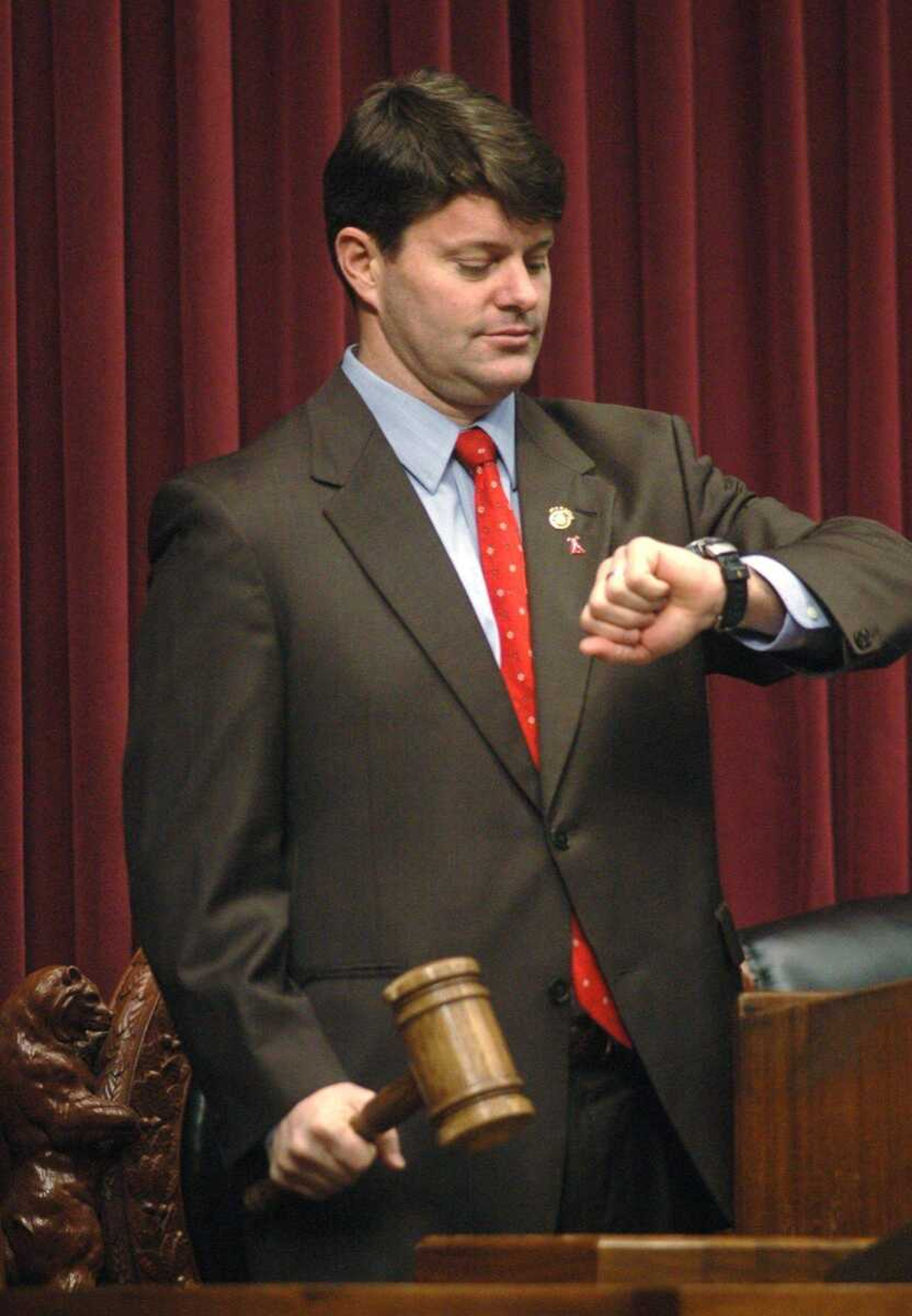 Speaker Rod Jetton, R-Marble Hill, Mo., checked his watch as he waited to call the House of Representatives to order Wednesday in Jefferson City, Mo. Wednesday was the first day of the new legislative session. (Kelley McCall ~ Associated Press)