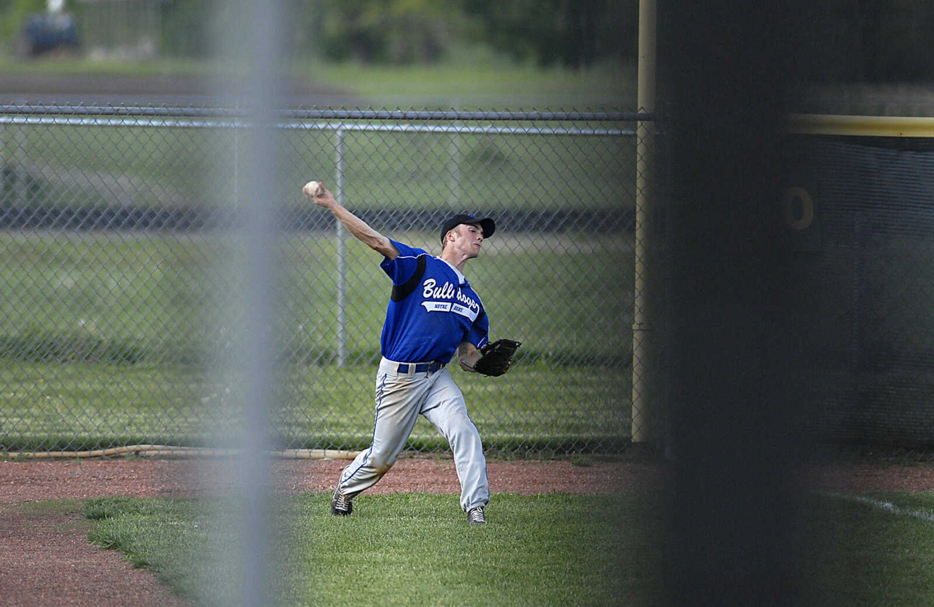 Notre Dame let fielder Jake Pewitt throws a ball back in from the corner Tuesday, April 28, 2009, against Sikeston in Cape Girardeau.