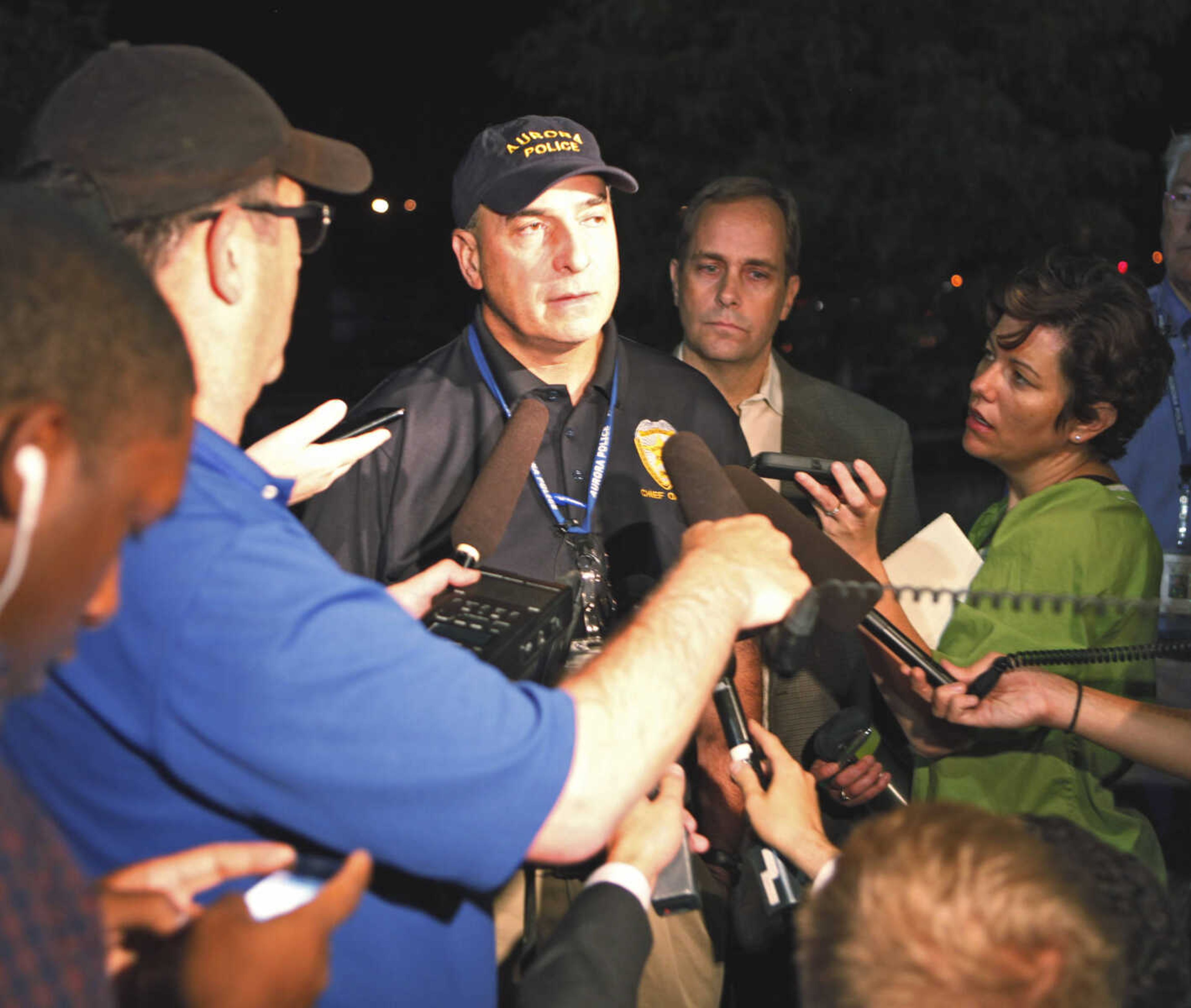 Aurora Police Chief Daniel Oates talks to media at Aurora Mall where as many as 14 people were killed and many injured at a shooting at the Century 16 movie theatre in Aurora, Colo., Friday, July 20, 2012. (AP Photo/Ed Andrieski)