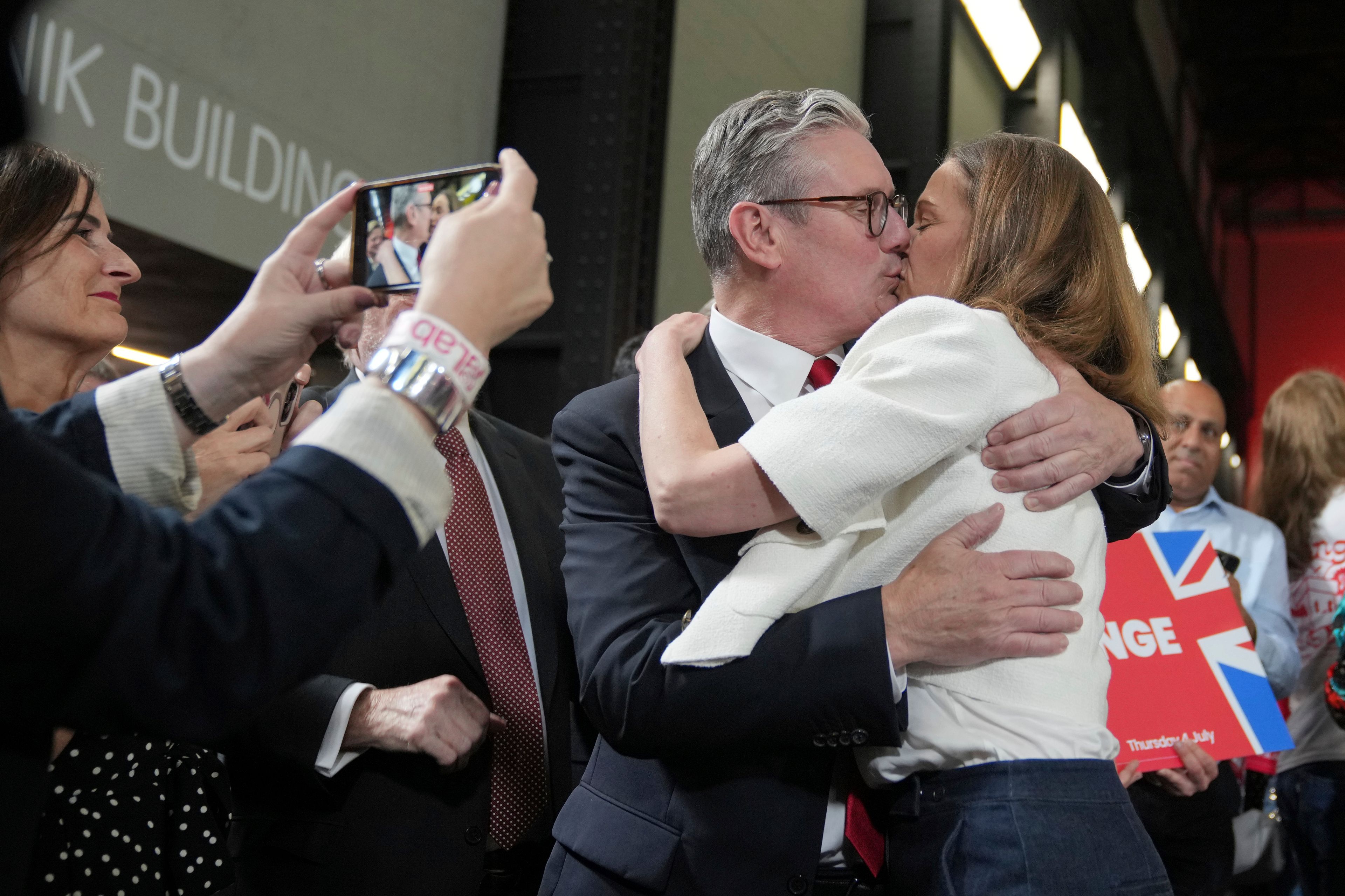 FILE - Labour Party leader Keir Starmer kisses his wife Victoria after he spoke to his supporters at the Tate Modern in London, Friday, July 5, 2024. (AP Photo/Kin Cheung, File)