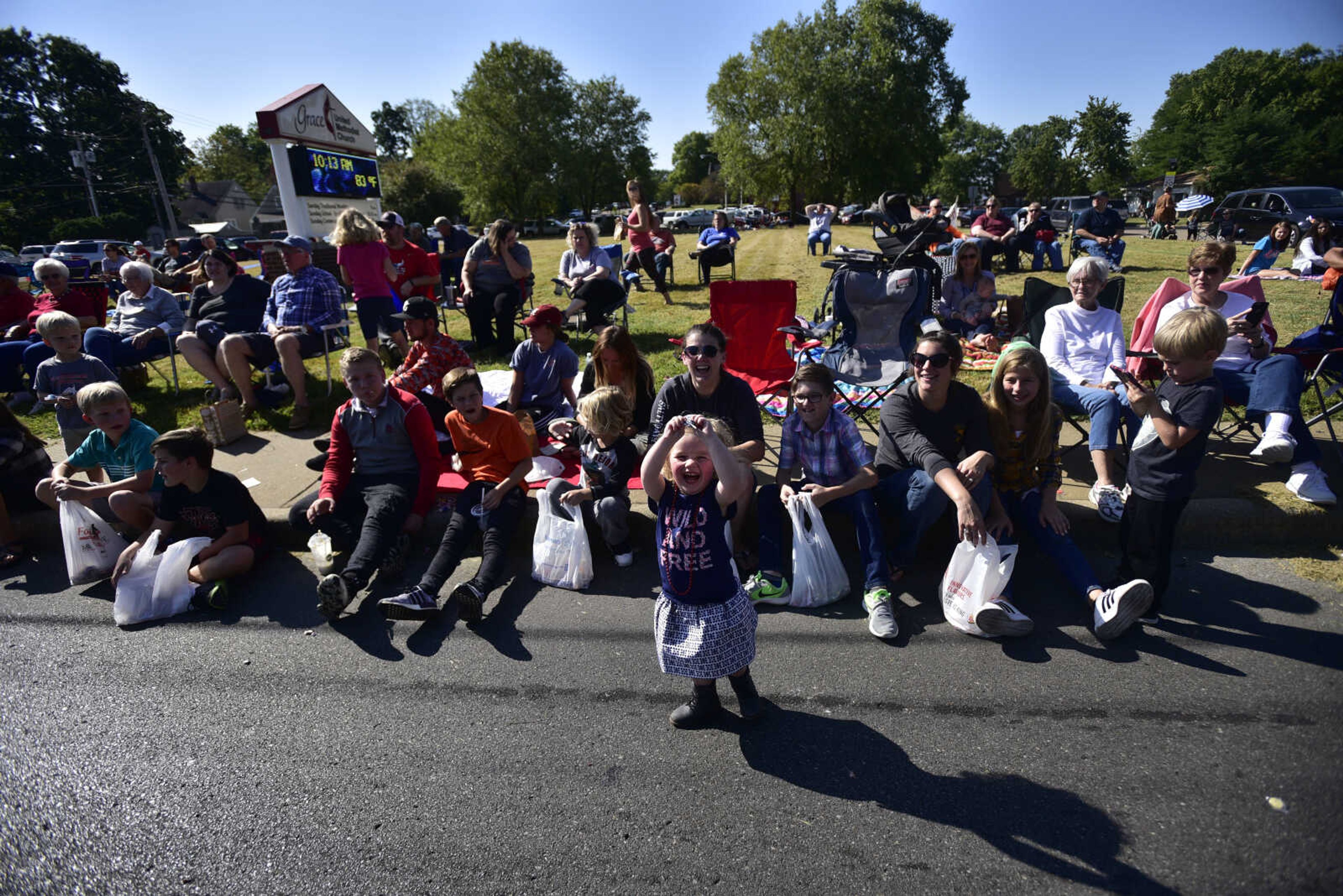 People wave during the SEMO District Fair parade Saturday, Sept. 9, 2017 in Cape Girardeau.