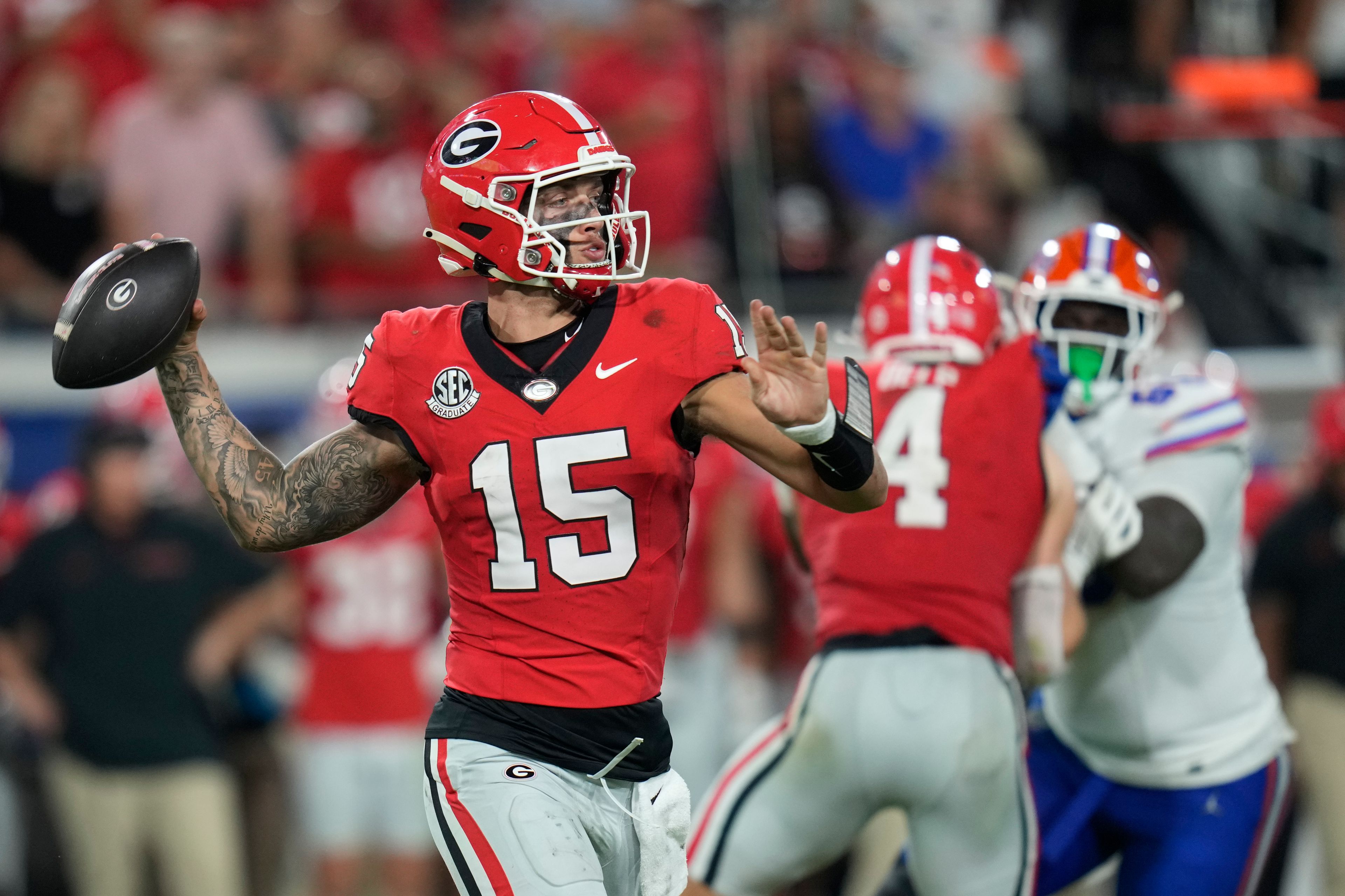 Georgia quarterback Carson Beck (15) throws a pass during the second half of an NCAA college football game against Florida, Saturday, Nov. 2, 2024, in Jacksonville, Fla. (AP Photo/John Raoux)