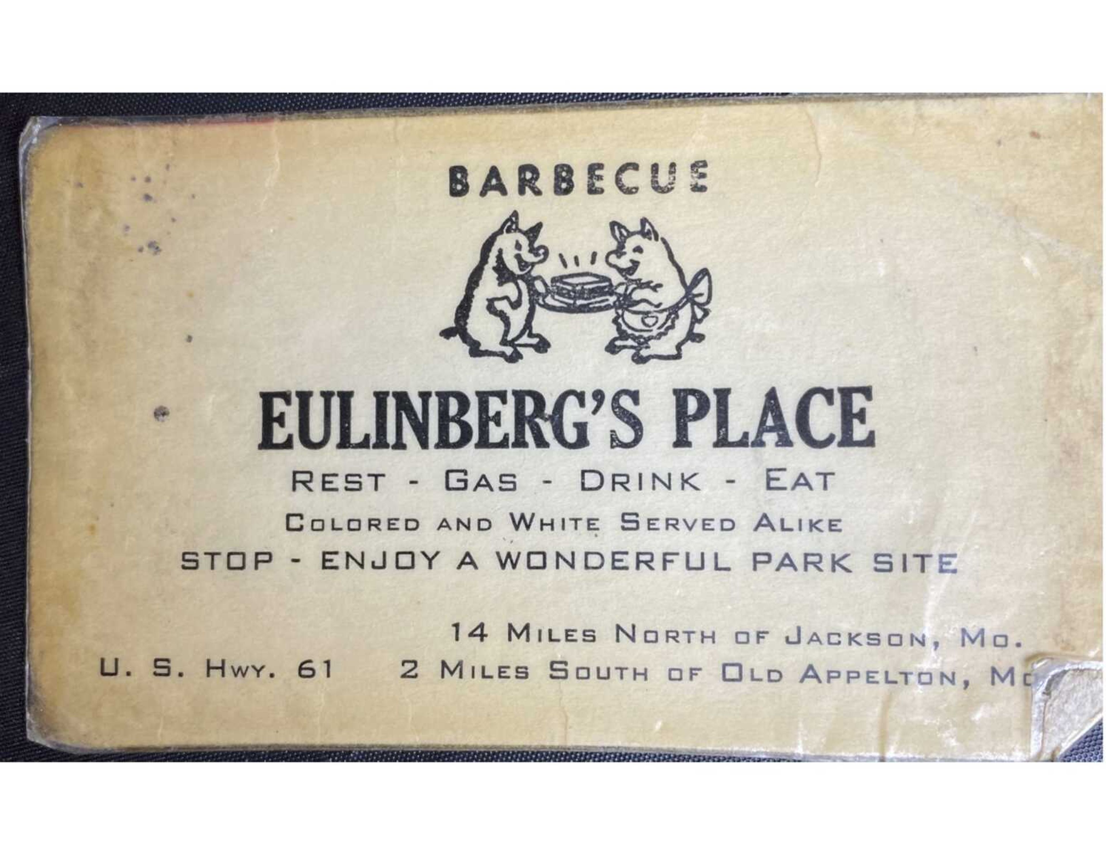 A wallet-worn business card is an example of Shannon Eulinberg's many methods of promoting his barbecue restaurant and gas station. Eulinberg's Place also was listed in 1961-64 editions of The Traveler's Green Book, Guide for Travel & Vacations. The Green Book guided Black travelers to safe and accommodating places to eat, buy gasoline, and lodging while traveling.