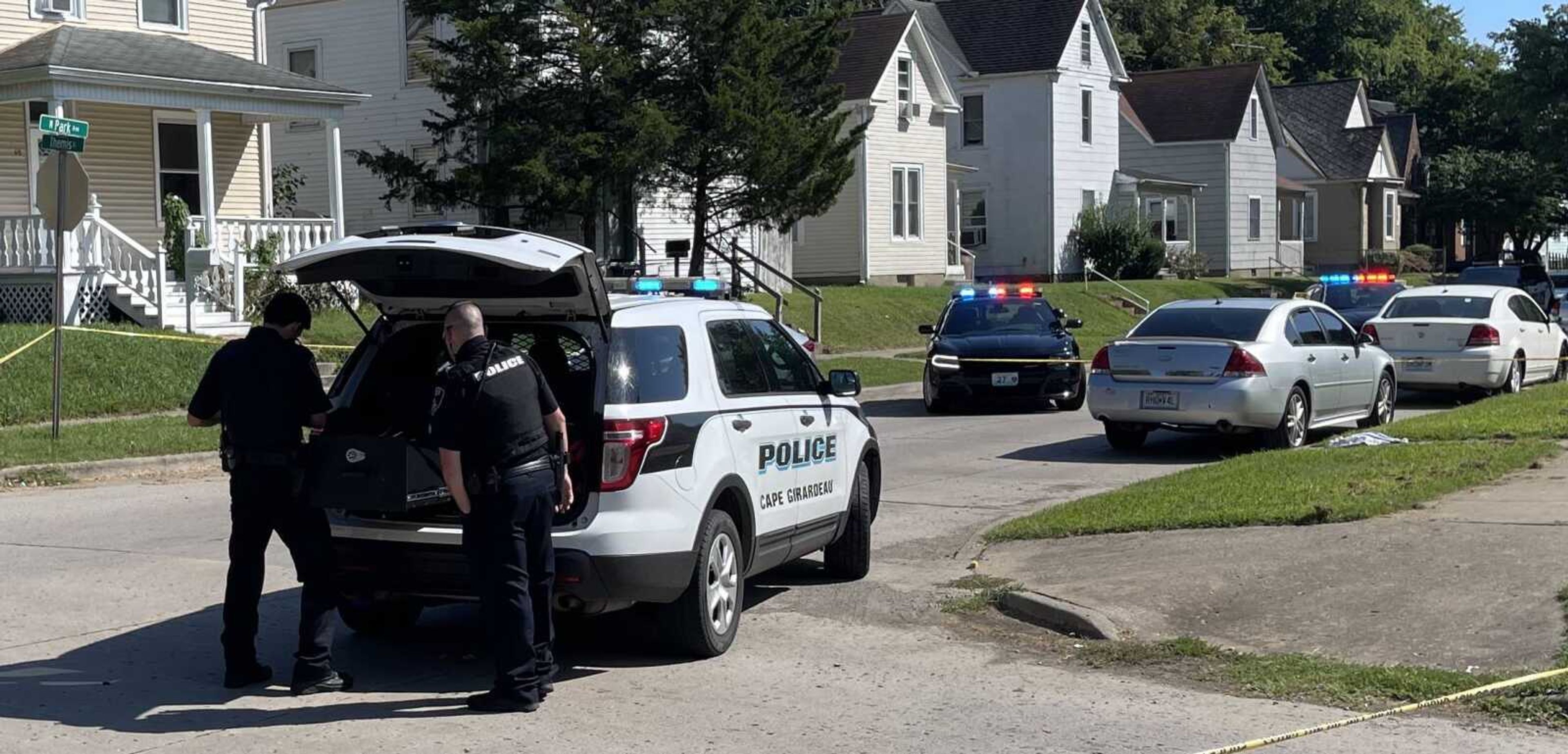 Cape Girardeau police take custody of a handgun and ammunition at the scene of a Monday afternoon shooting. It was unclear if the firearm was the one used in a shooting that left a man with a gunshot wound to the torso. According to a witness at the scene, the wound did not appear to be life-threatening.