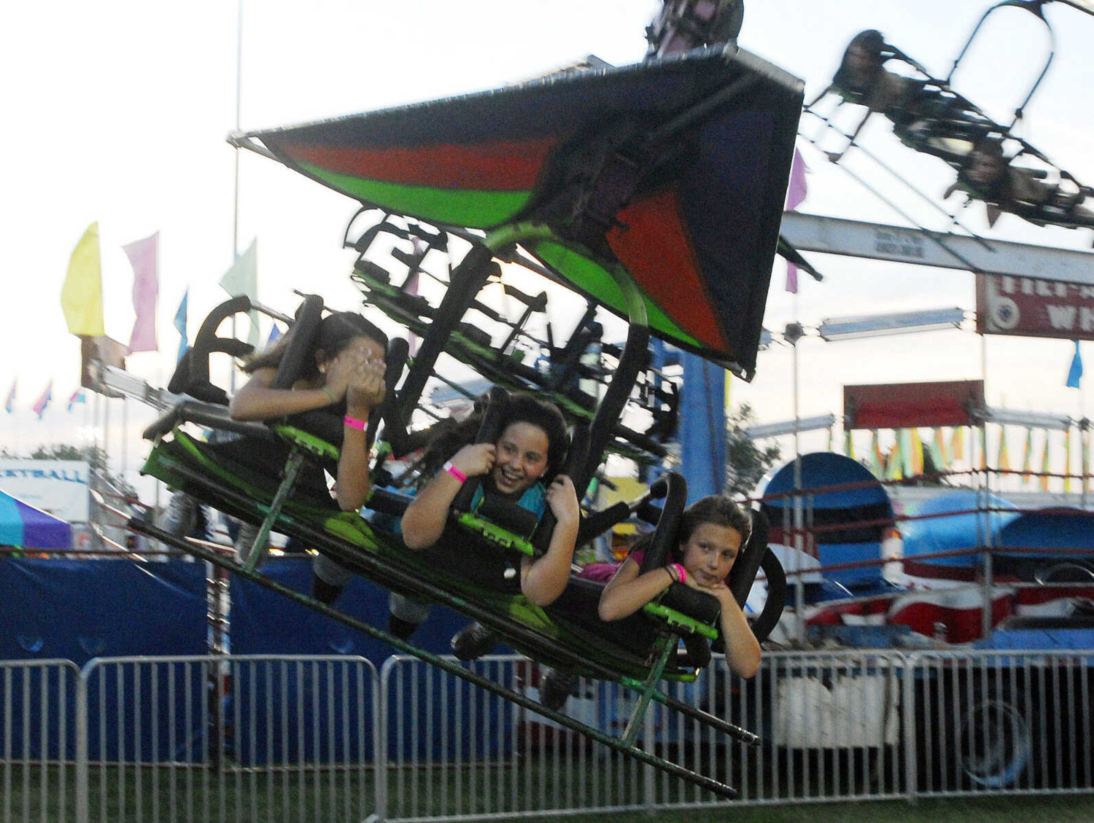 LAURA SIMON~lsimon@semissourian.com
People react as they fly through the air Thursday, September 16, 2010 during the 155th Annual SEMO District Fair.