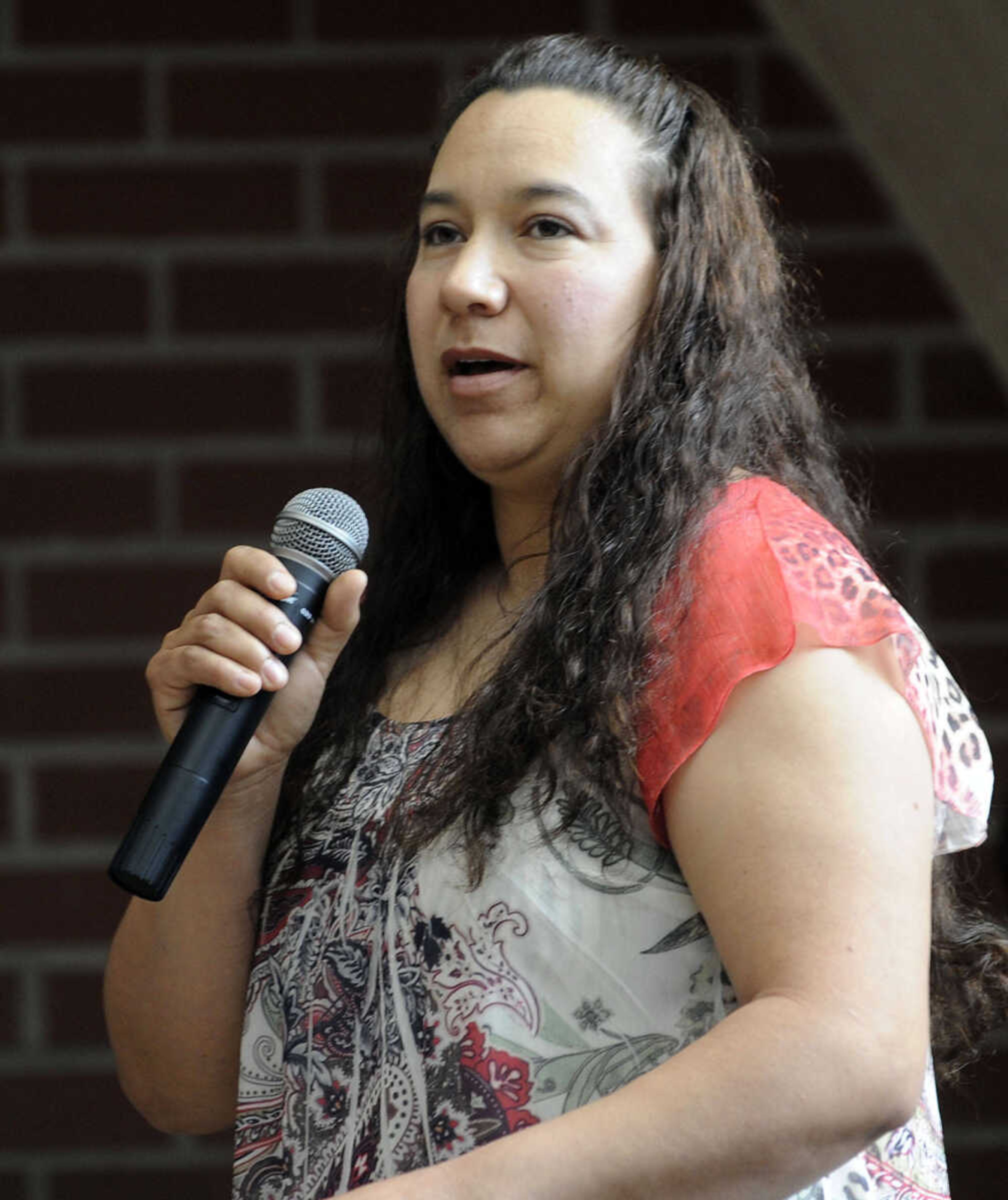 Leticia Fraire of Mexico speaks during a naturalization ceremony Friday, May 2, 2014 at the Rush H. Limbaugh Sr. U.S. Courthouse in Cape Girardeau.