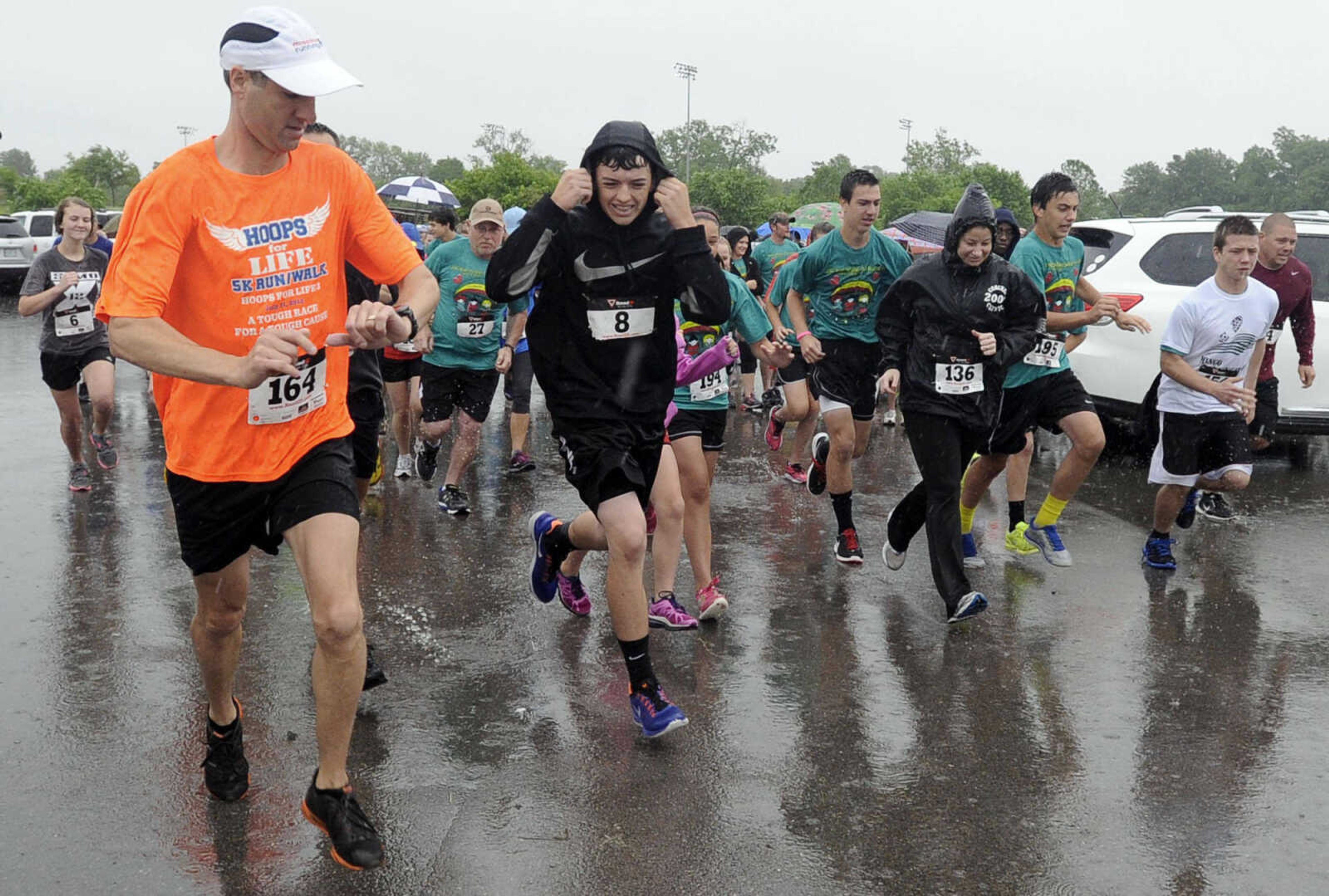 FRED LYNCH ~ flynch@semissourian.com
Runners begin the Jacque Waller 5K run Saturday, June 1, 2013 at Shawnee Park in Cape Girardeau.