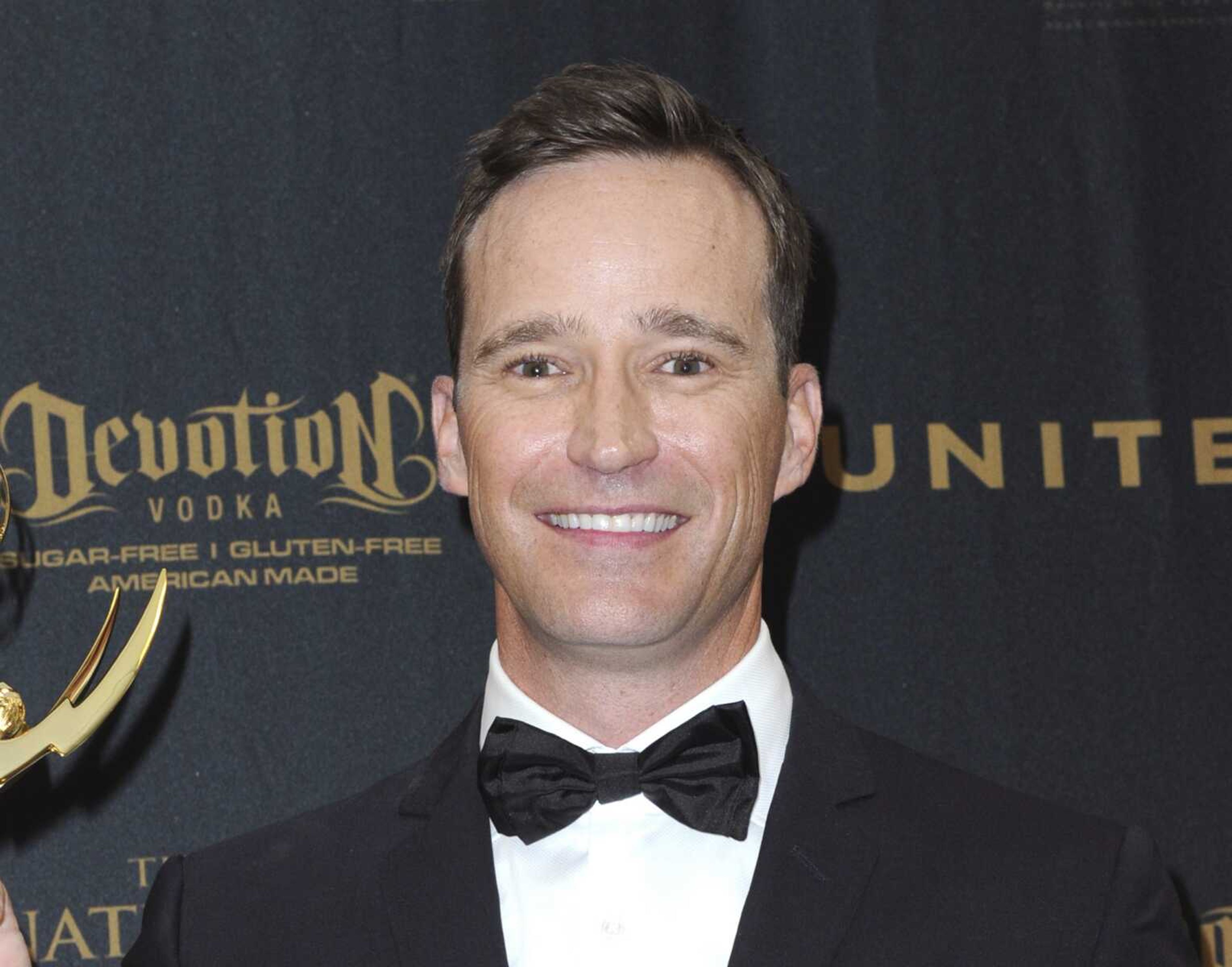 Producer Mike Richards poses in the pressroom at the 43rd annual Daytime Emmy Awards on May 1, 2016, in Los Angeles.