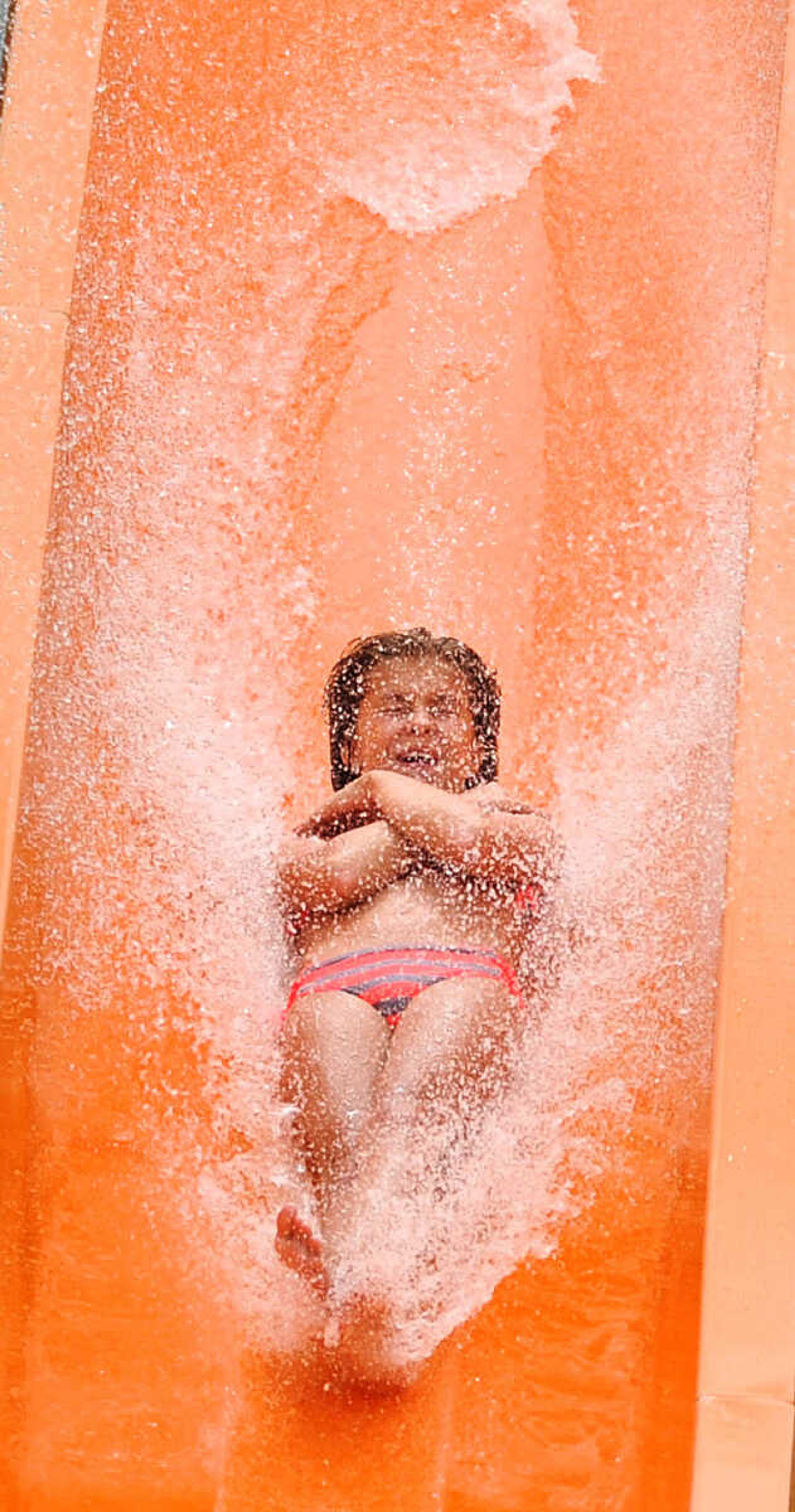 LAURA SIMON ~ lsimon@semissourian.com

The Cape Girardeau Parks and Recreation Department opened the new 265-foot-long free-fall slide, 259-foot-long triple-drop slide and a three-Lane 319-foot-long mat racer with 30-foot tower, at Cape Splash Family Aquatic Center, Thursday, July 9, 2015.