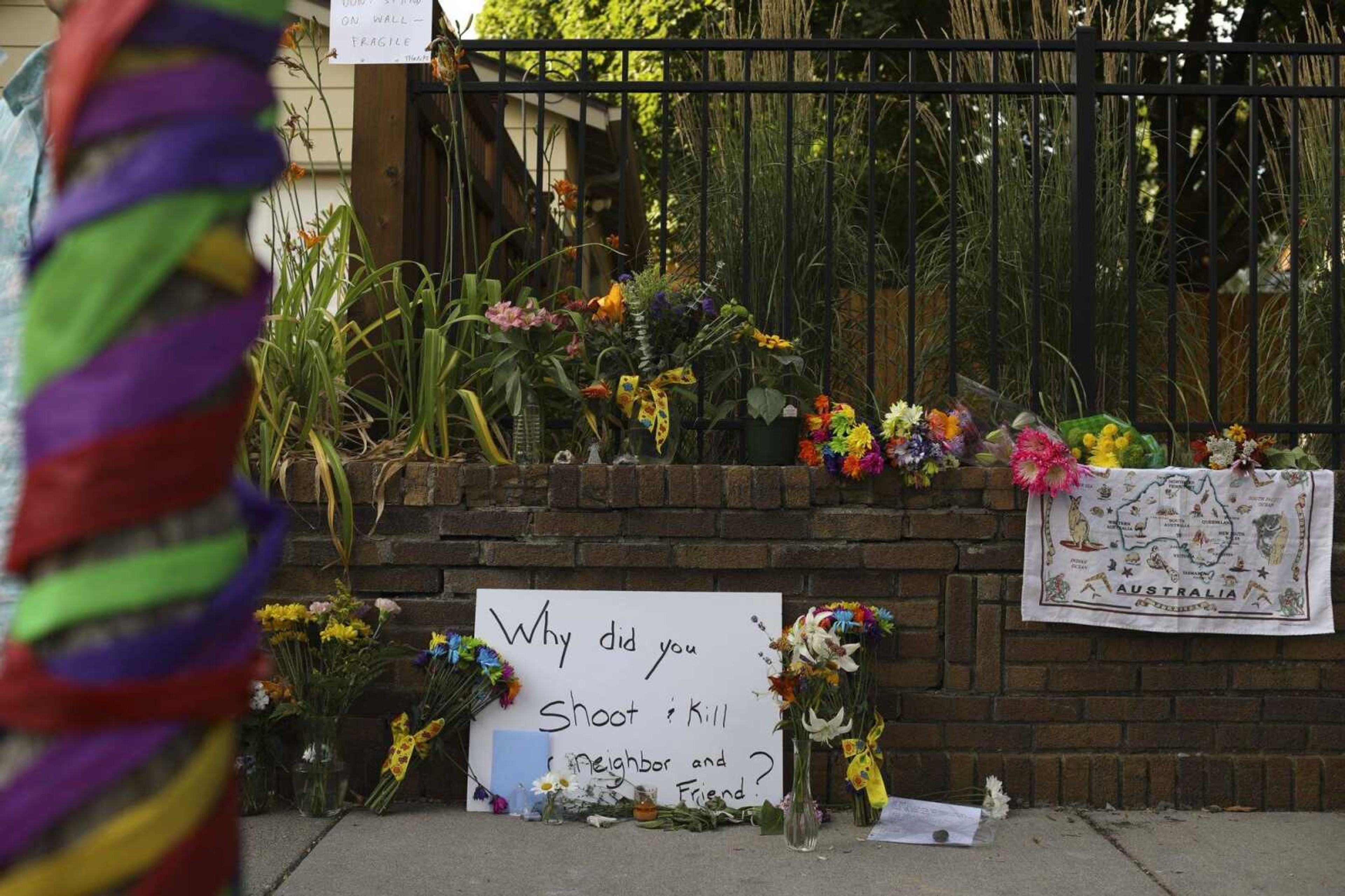 A memorial to a Justine Damond, from Sydney, Australia, who was shot and killed late Saturday by police, is seen Sunday evening in Minneapolis.