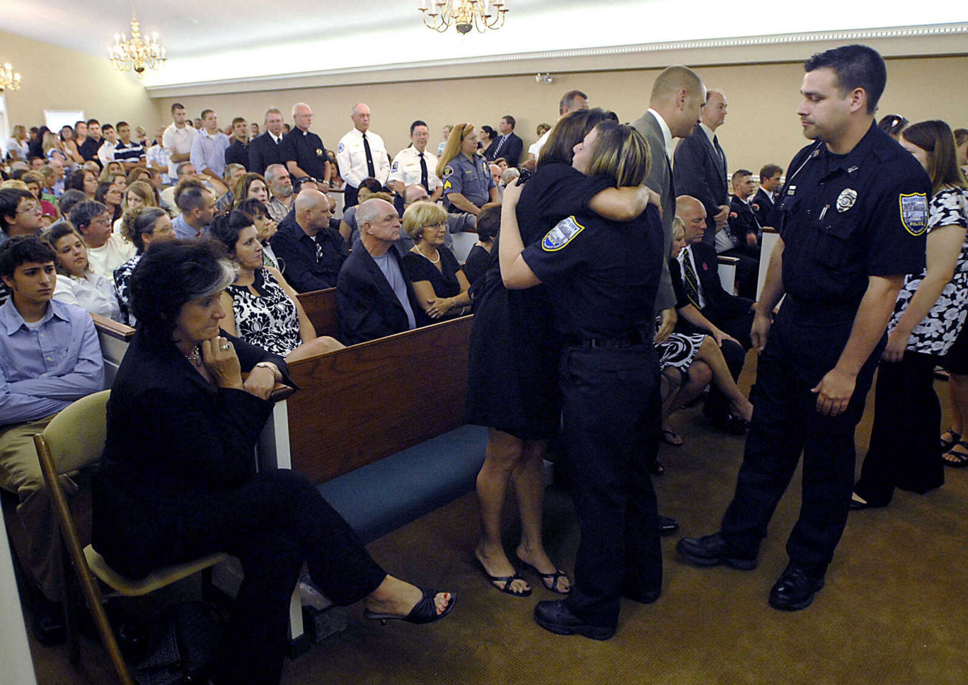 Emergency personnel came out in large numbers at the funeral for Alexis Cummins Wednesday, June 3, 2009, in Sikeston.