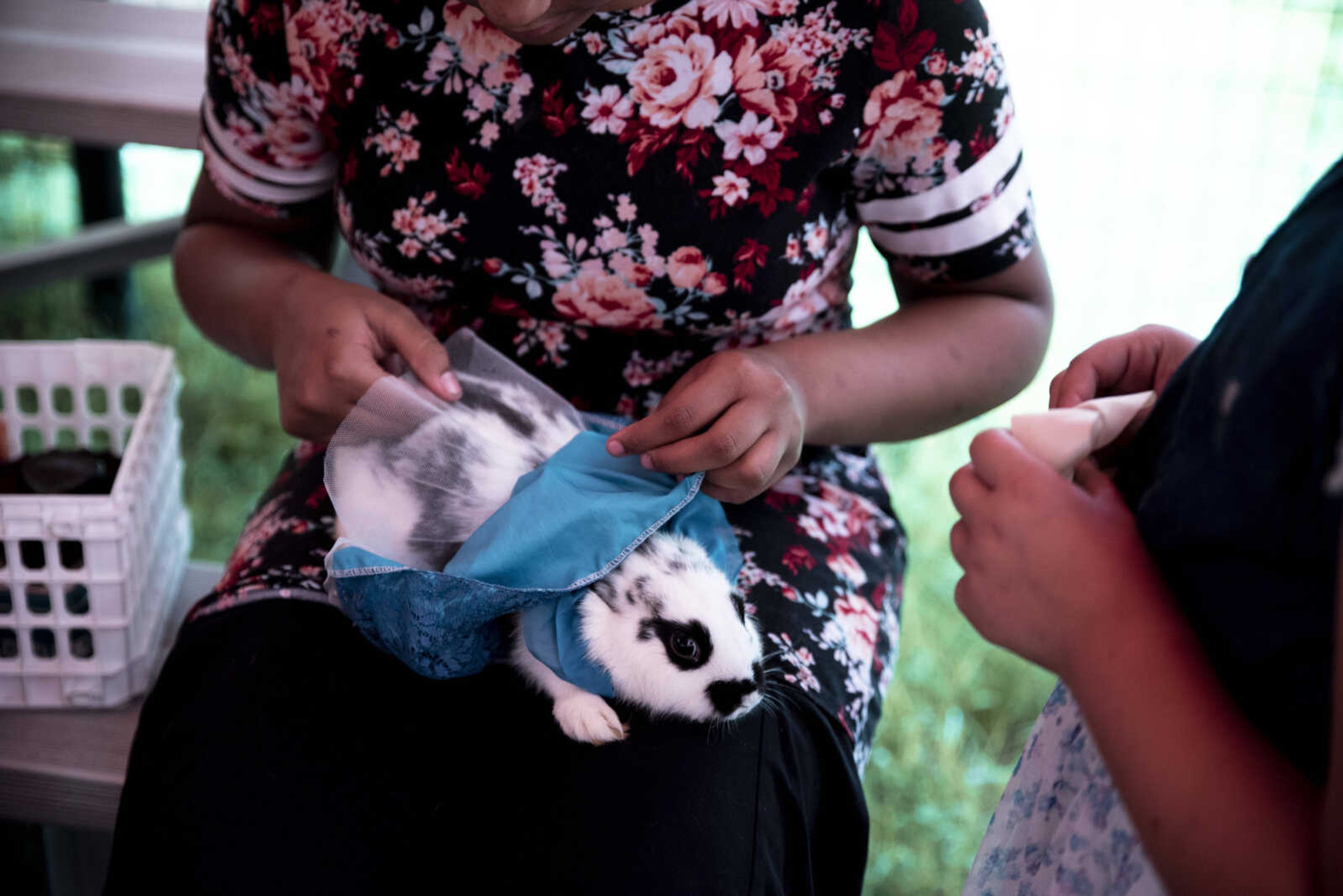 Breanna Shands, 12, adjusts the dress on Hazel the rabbit before the Poultry and Rabbit Dress-Up Contest at the SEMO District Fair Sunday, Sept. 9, 2018 in Cape Girardeau.