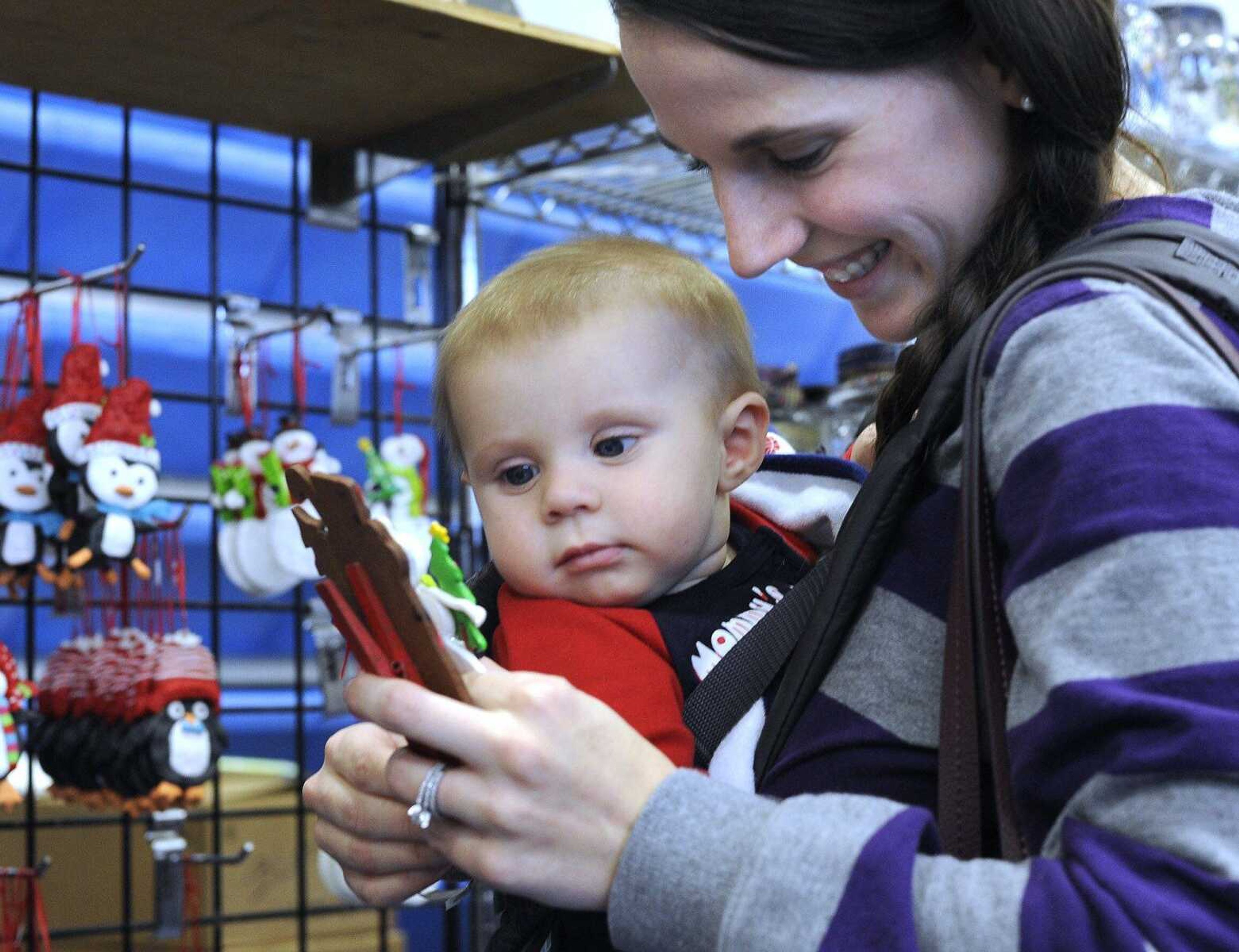 Janna Owens and her son, Grant, of Gordonville take in the 20th annual Crafts, Gifts & Collectibles Show on Nov. 22 at Notre Dame Regional High School. (Fred Lynch)