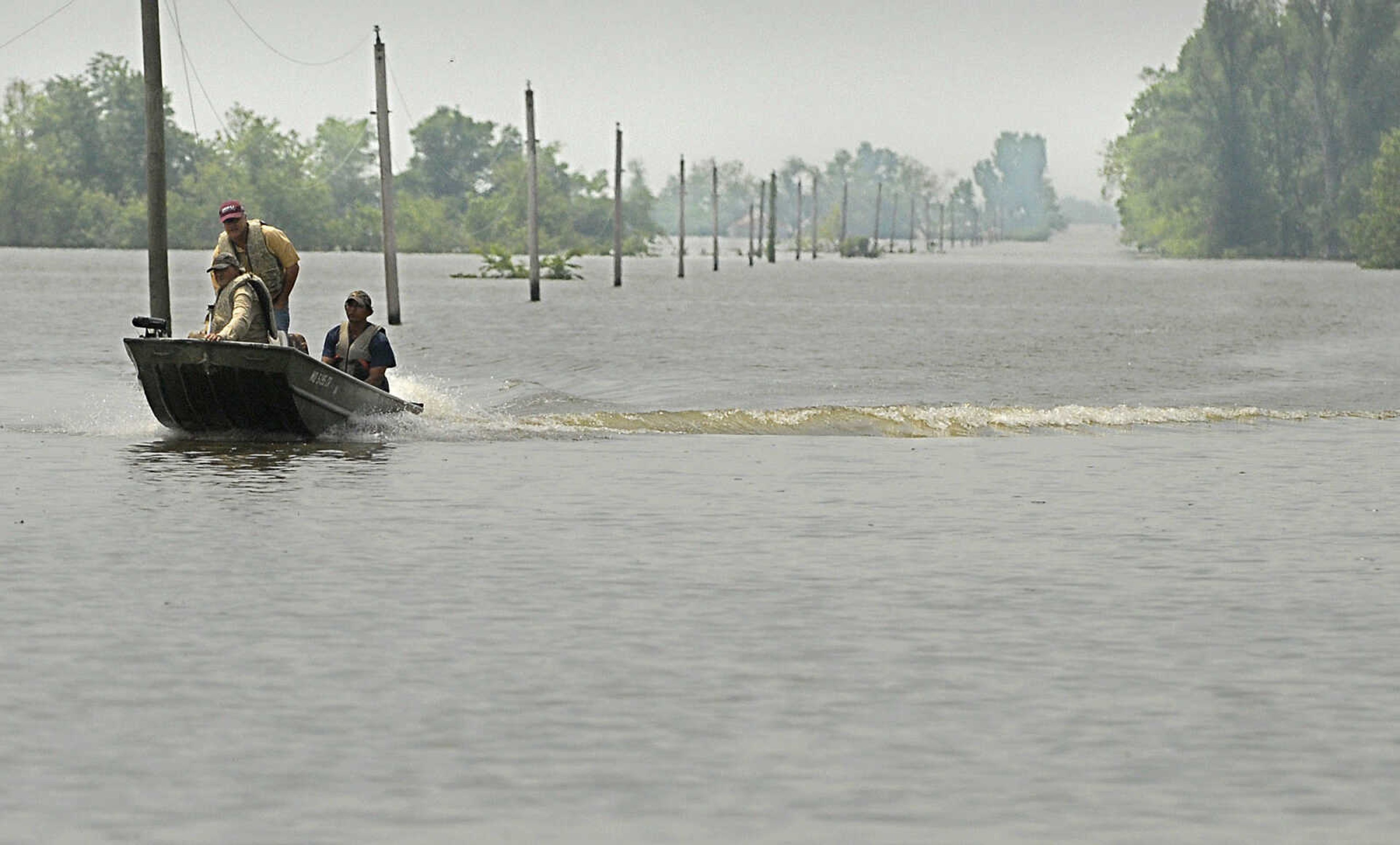 LAURA SIMON~lsimon@semissourian.com
Land owners return to Highway 102 Monday, May 9, 2011 after checking on their property in the floodway in Mississippi County.