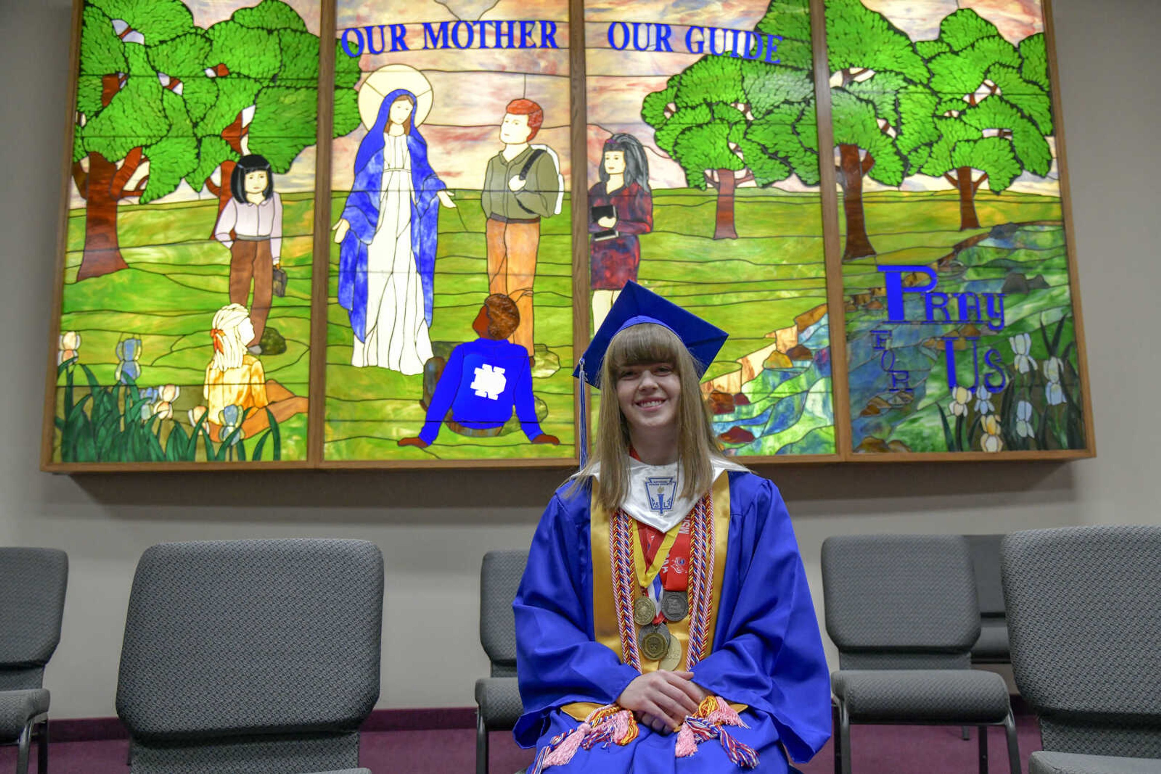 Notre Dame's valedictorian Claire Southard poses for a photo in the school's chapel in May.