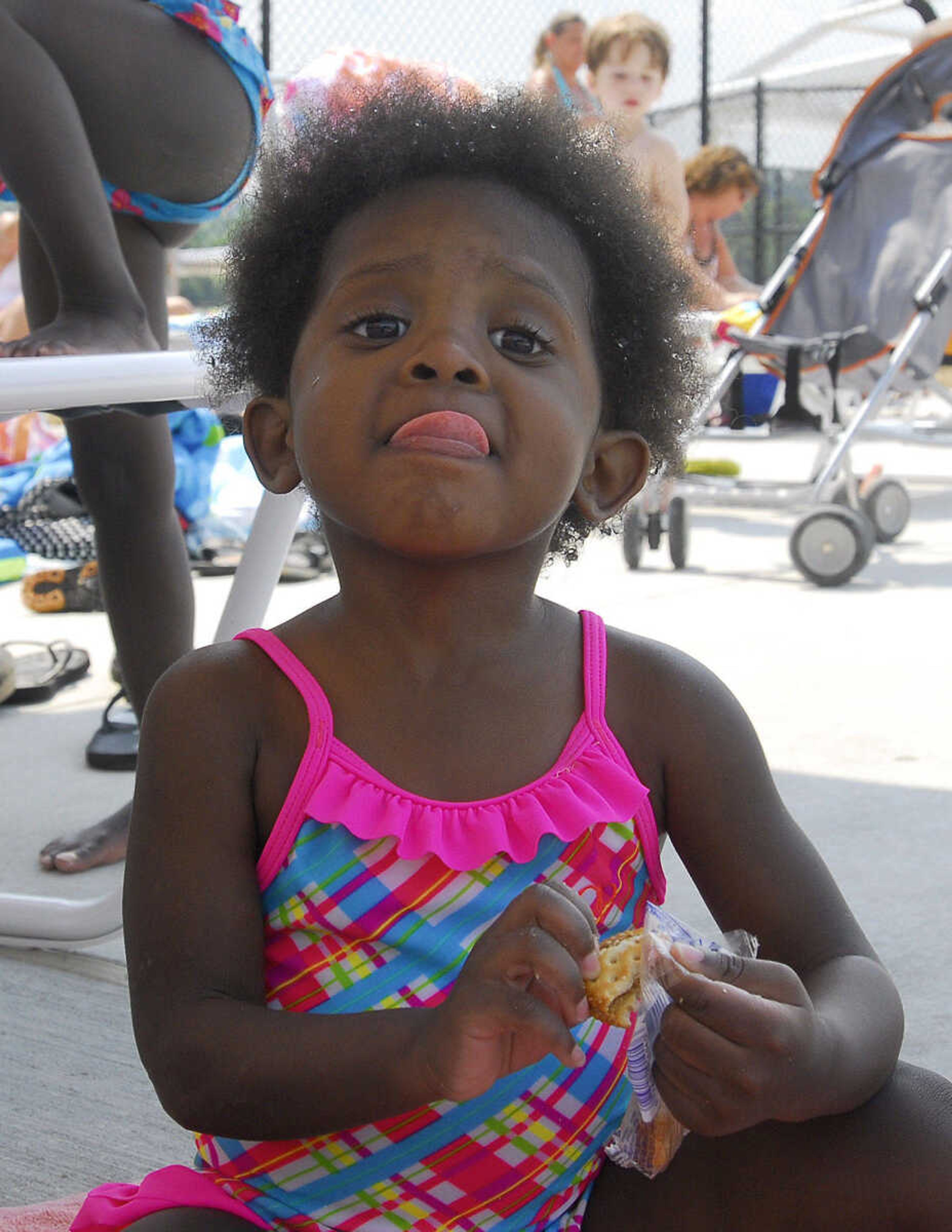 LAURA SIMON~lsimon@semissourian.com
Zariah Smith licks cracker crumbs off her upper lip Saturday, May 29, 2010 at Cape Splash.