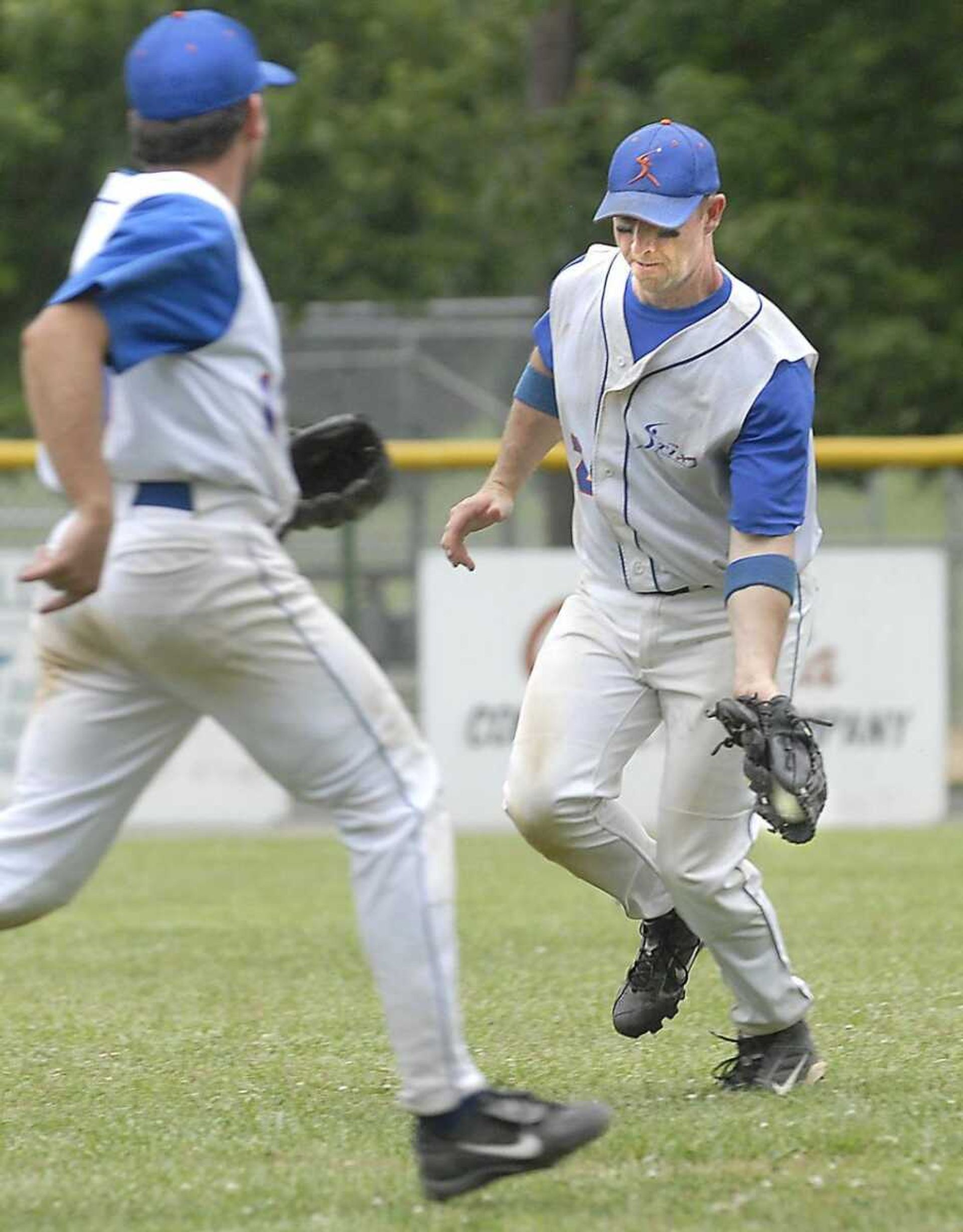 Bloomington's right fielder Doug Williams caught a Vandalia fly ball as second baseman Paul Montero covered on the play during the first game of the championship round of the Kelso Klassic on Sunday.