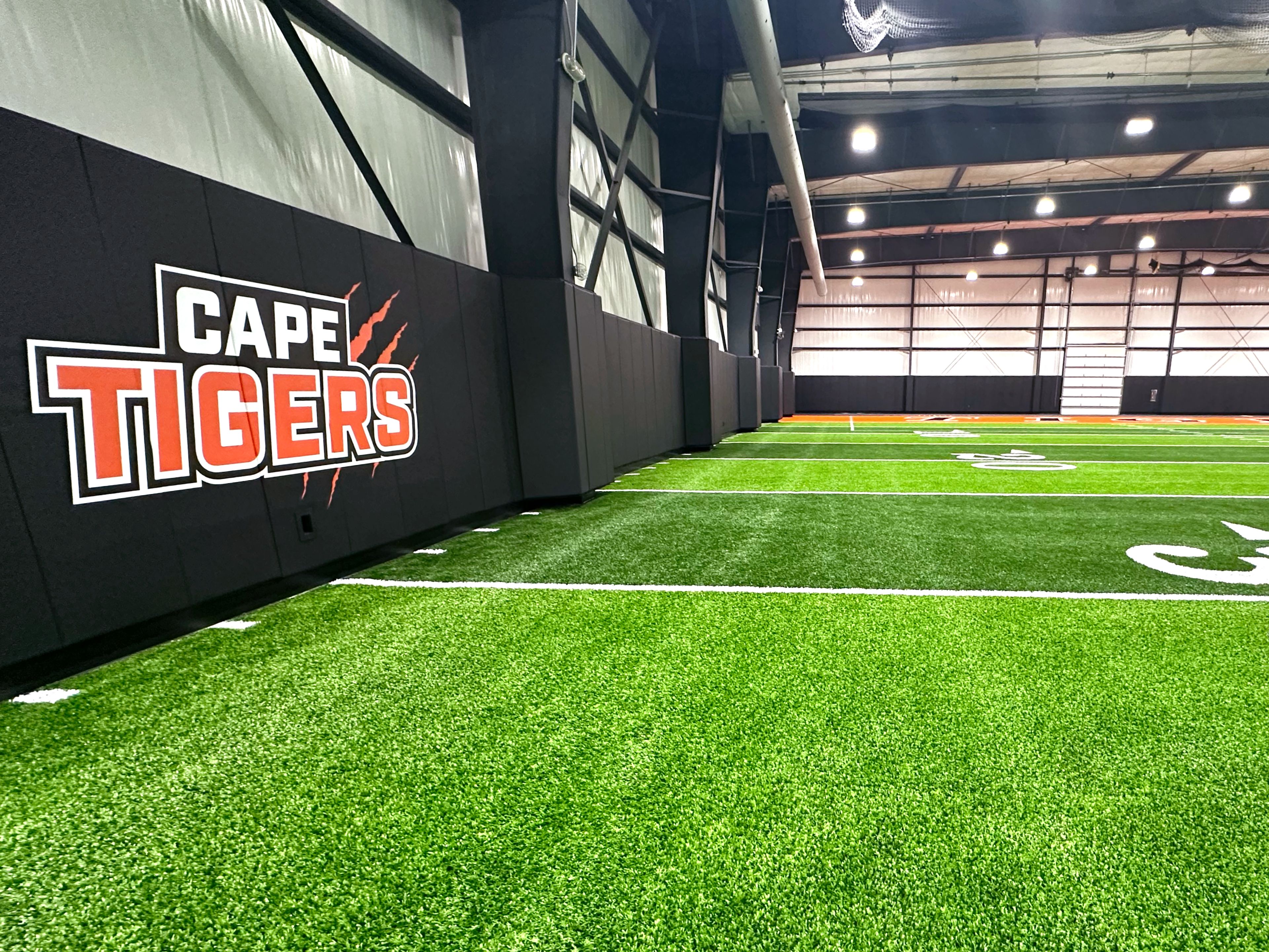 Padding with the Cape Tigers logo covers the walls of Cape Girardeau Public Schools' new indoor athletic facility. 