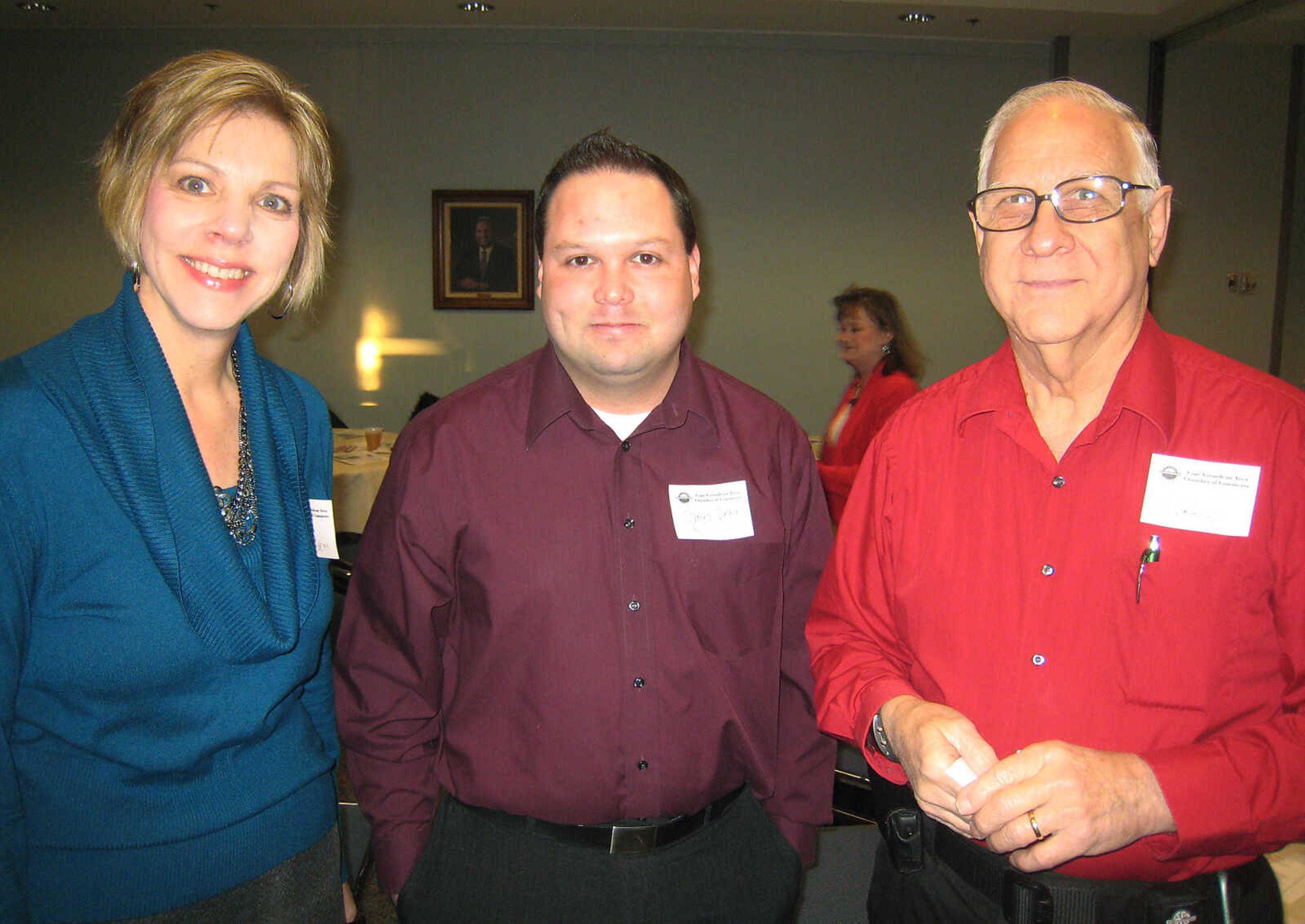 Sharon Derrington, Missouri State Probation and Parole, left, James Boyer, Job Corps, and Jim Watkins at the Cape Girardeau Area Chamber of Commerce First Friday Coffee, Feb. 1, at the Show Me Center.