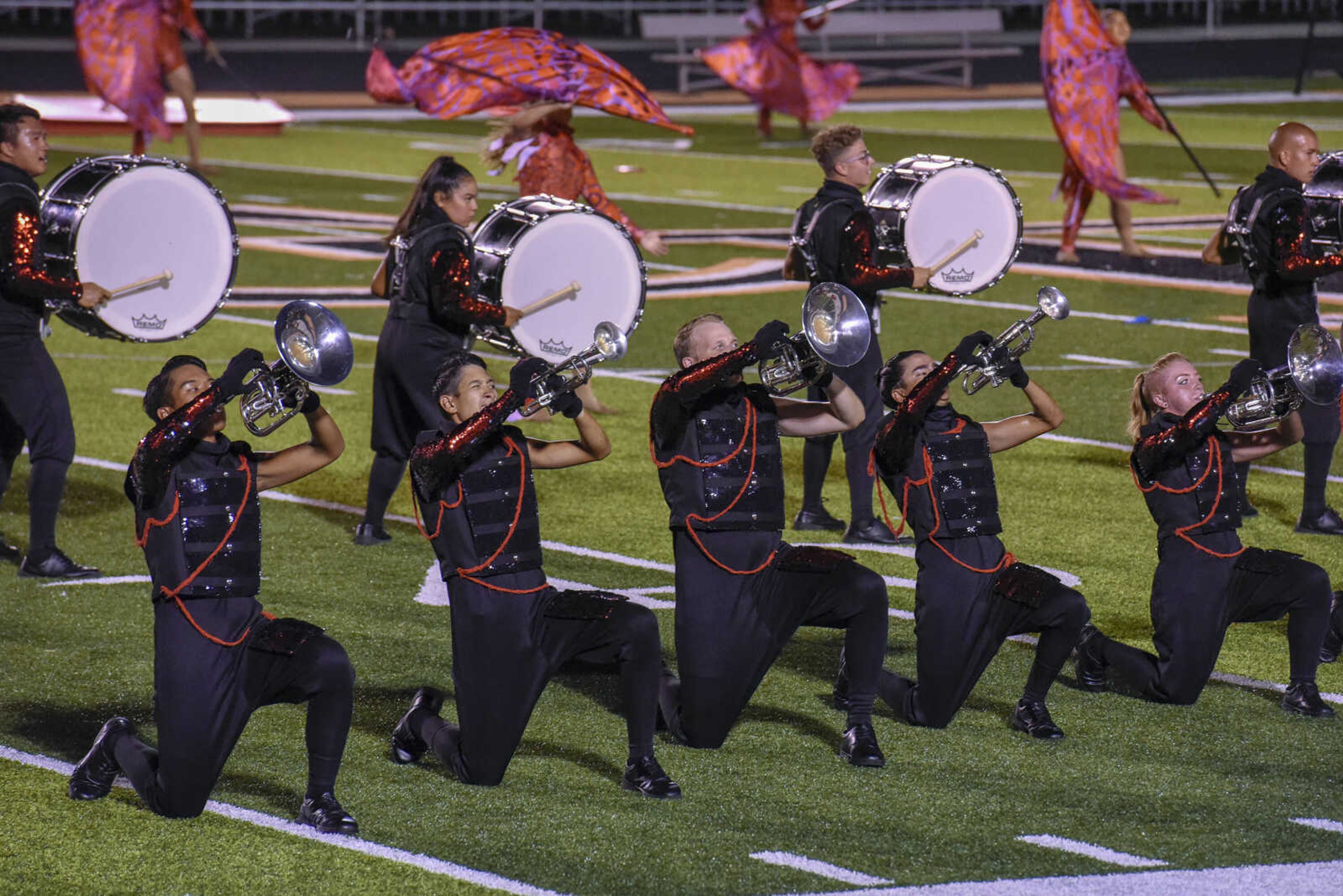 Mandarins from Sacramento, California perform during the Drum Corps International program "Drums Along the Mississippi" at the Cape Central High School field Tuesday Aug. 10, 2021.