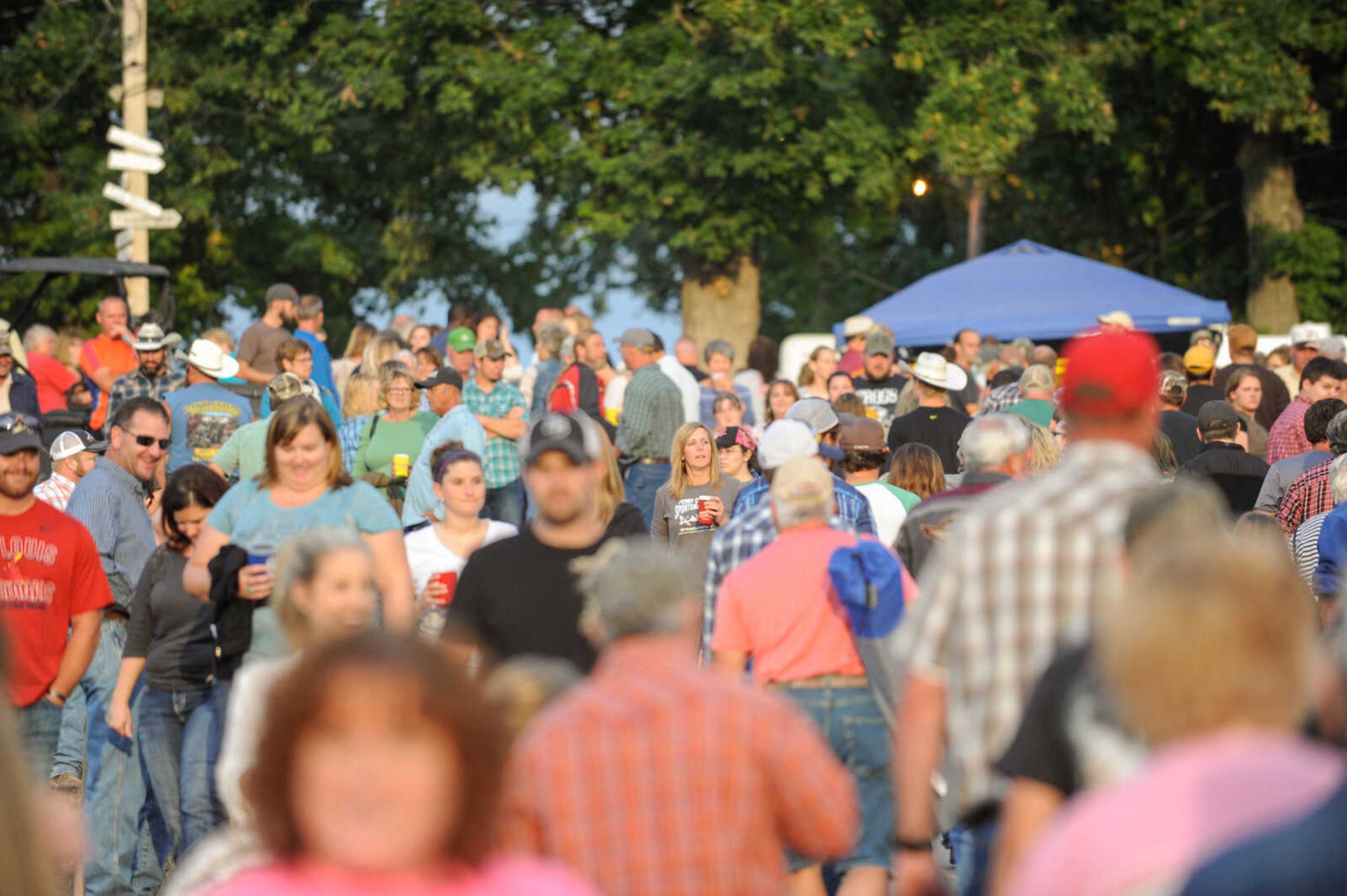 GLENN LANDBERG ~ glandberg@semissourian.com

Crowds gather for the East Perry Community Fair Saturday, Sept. 26, 2015 in Altenburg, Missouri.