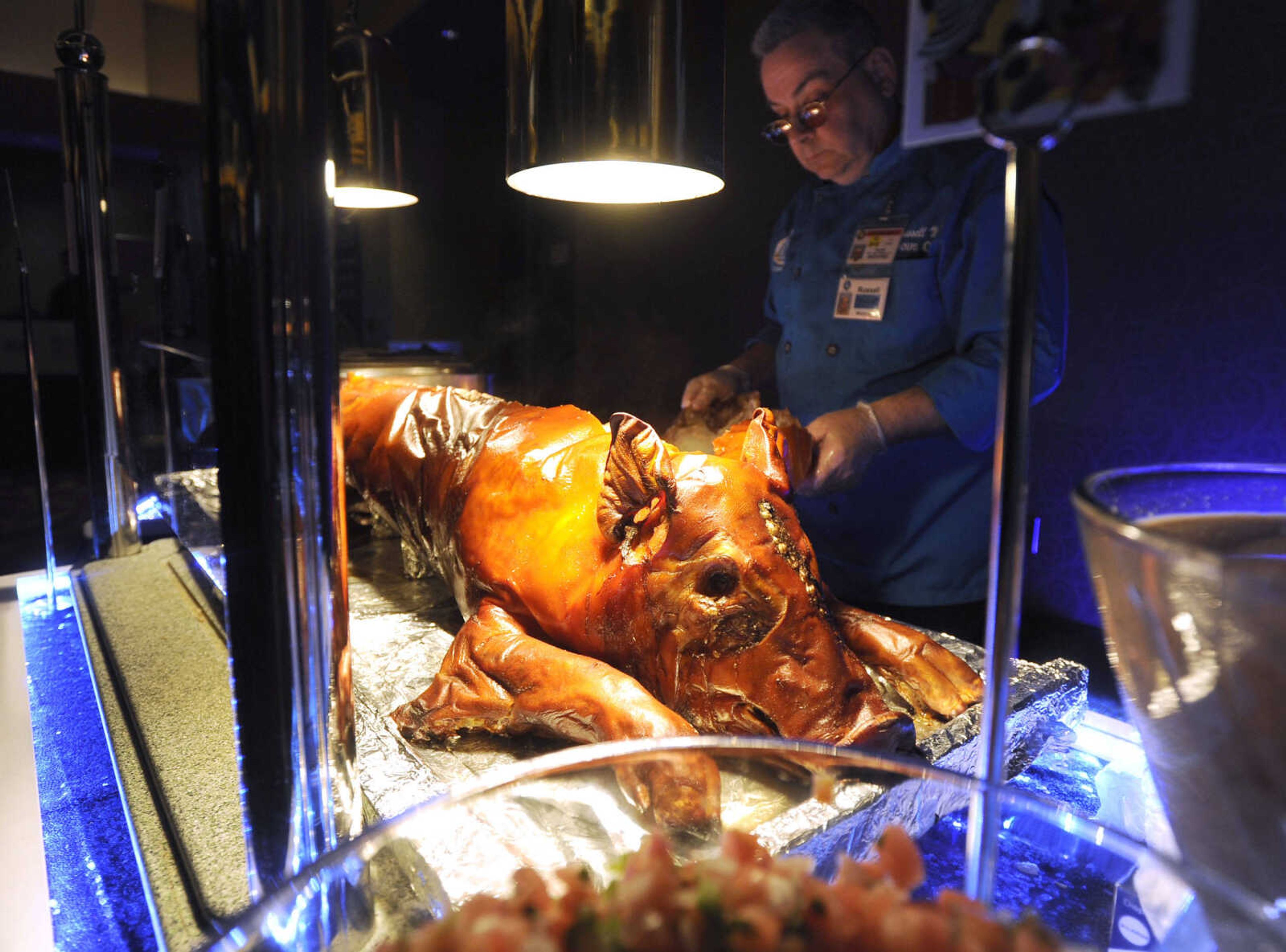 FRED LYNCH ~ flynch@semissourian.com
Pork is served Thursday, Aug. 17, 2017 at a retirement reception for Saint Francis Healthcare System president and CEO Steven C. Bjelich at Isle Casino Event Center.