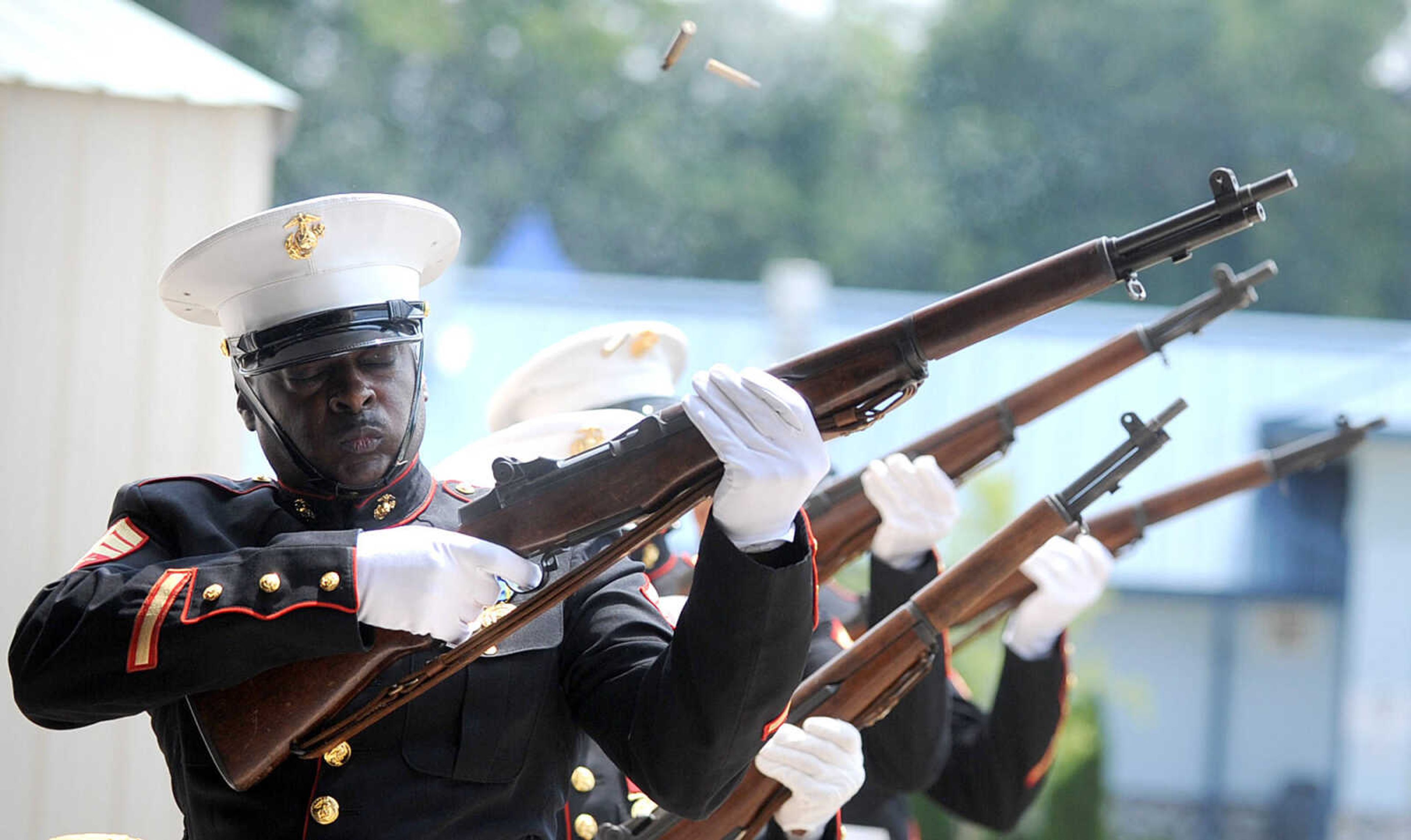 LAURA SIMON ~ lsimon@semissourian.com
Sgt. Paul Bedell and the Marine Corps League fire the gun salute Monday, May 28, 2012 during the Joint Veterans Council Memorial Service at the Osage Centre in Cape Girardeau.