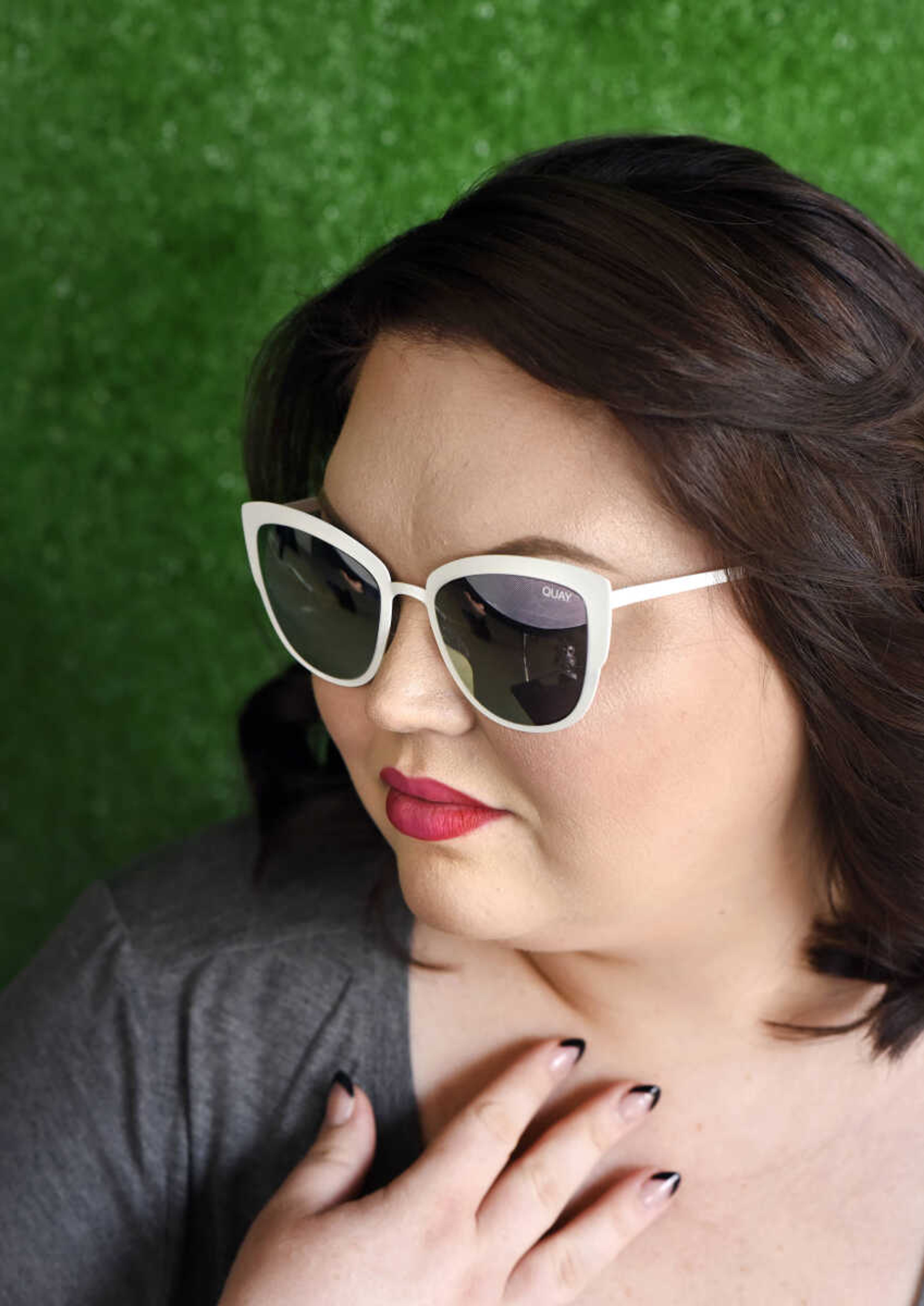 On Alana: Matte white frames from Quay Australia, $60 at Atelier