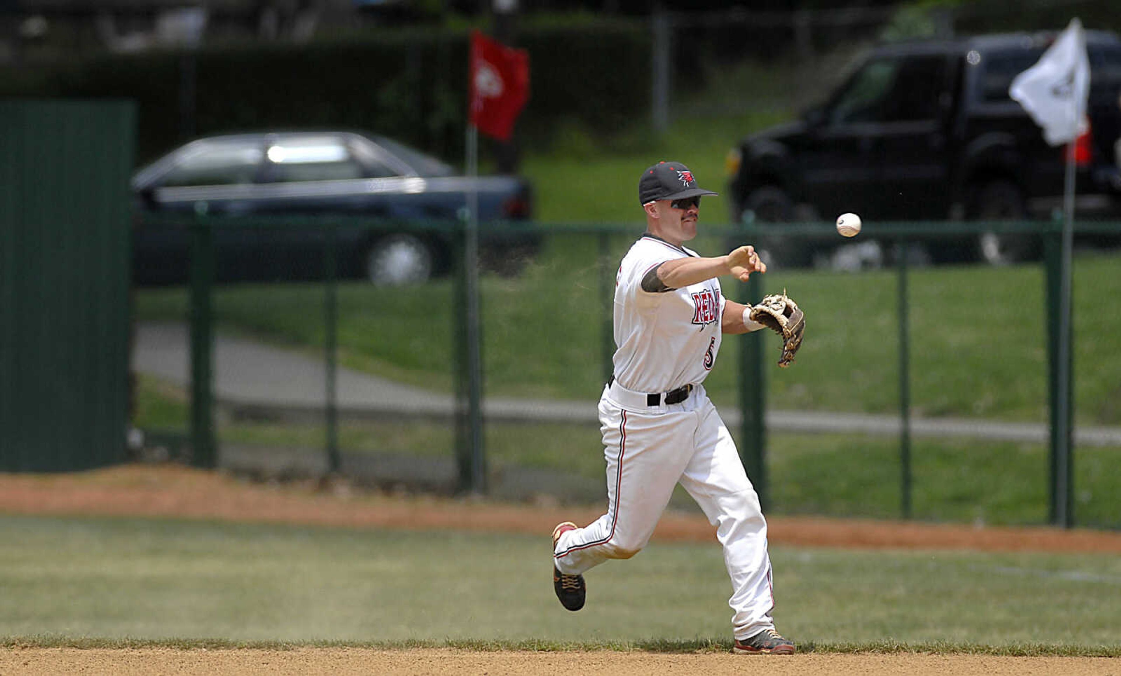 KIT DOYLE ~ kdoyle@semissourian.com
Second baseman Tony Spencer throws a runner out Friday, May 15, 2009, at Capaha Field.