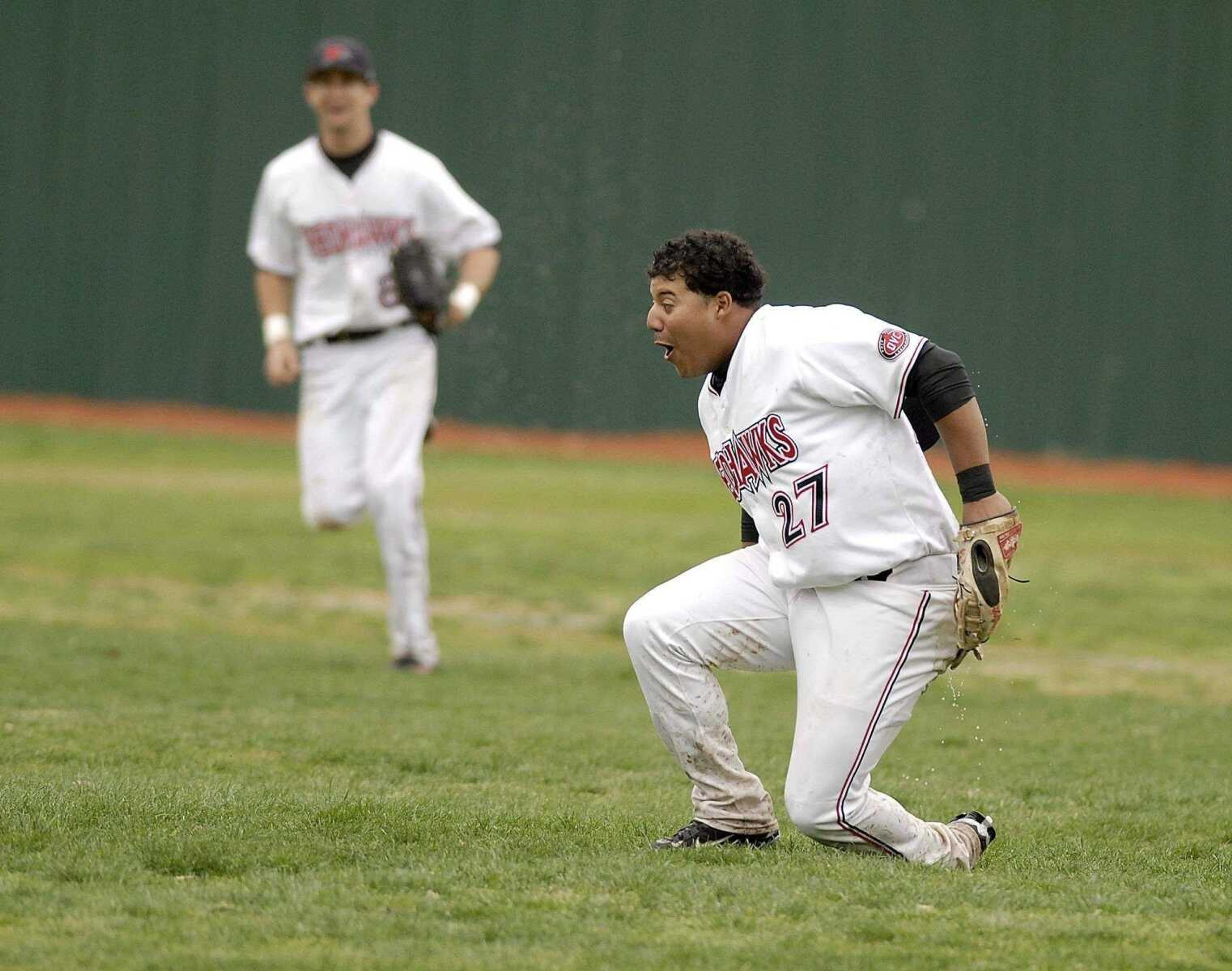 ELIZABETH DODD ~ edoddsemissourian.comSoutheast outfielder Tyrell Cummings laughs after sliding on the wet field to make a catch against UT-Martin during the sixth inning of the first game Saturday at Capaha Field.