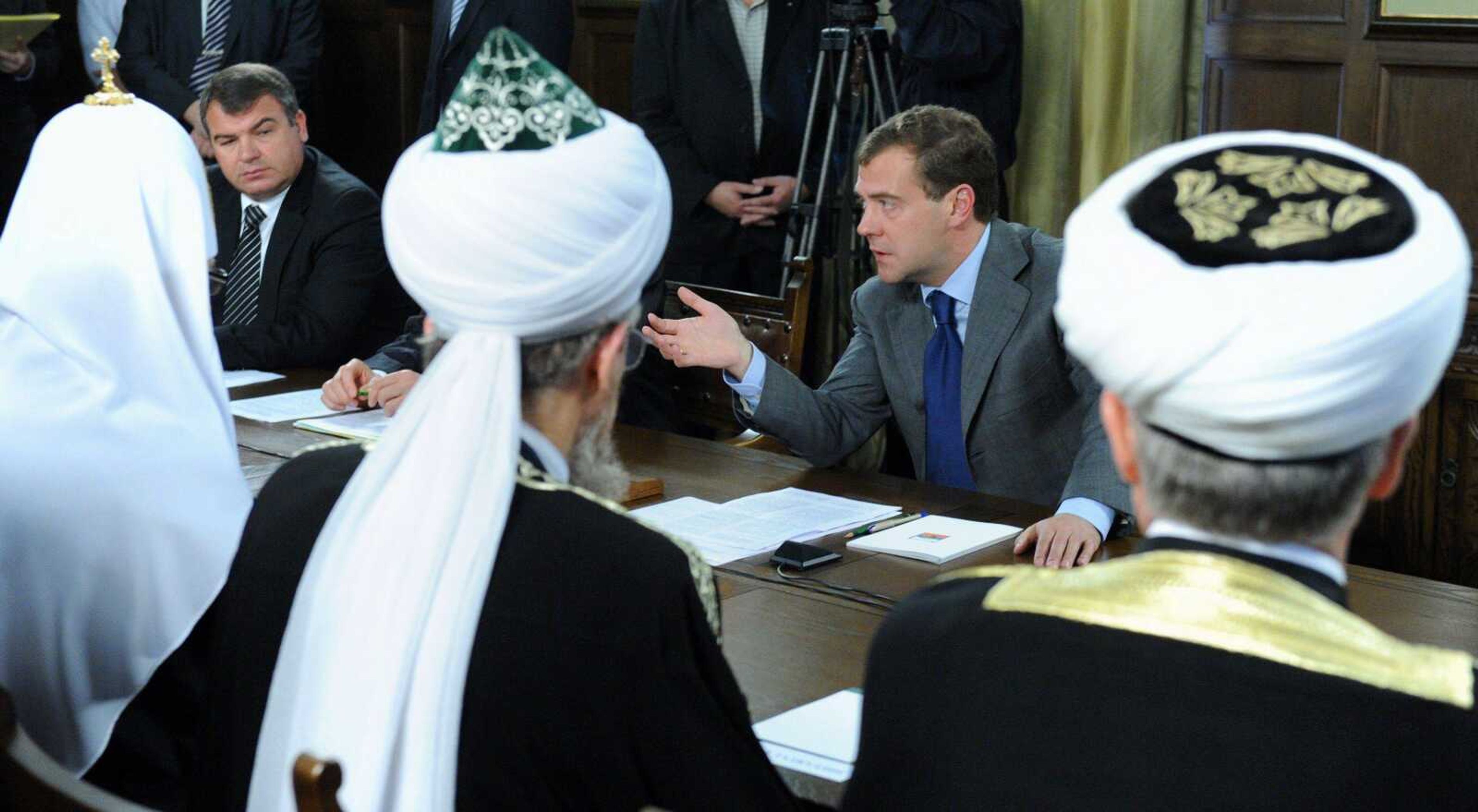 Russian President Dmitry Medvedev, second from right, speaks Tuesday during a meeting with the leaders of Russia's main religious denominations at the Barvikha presidential residence outside Moscow. (Alexander Nenenov ~ Pool)