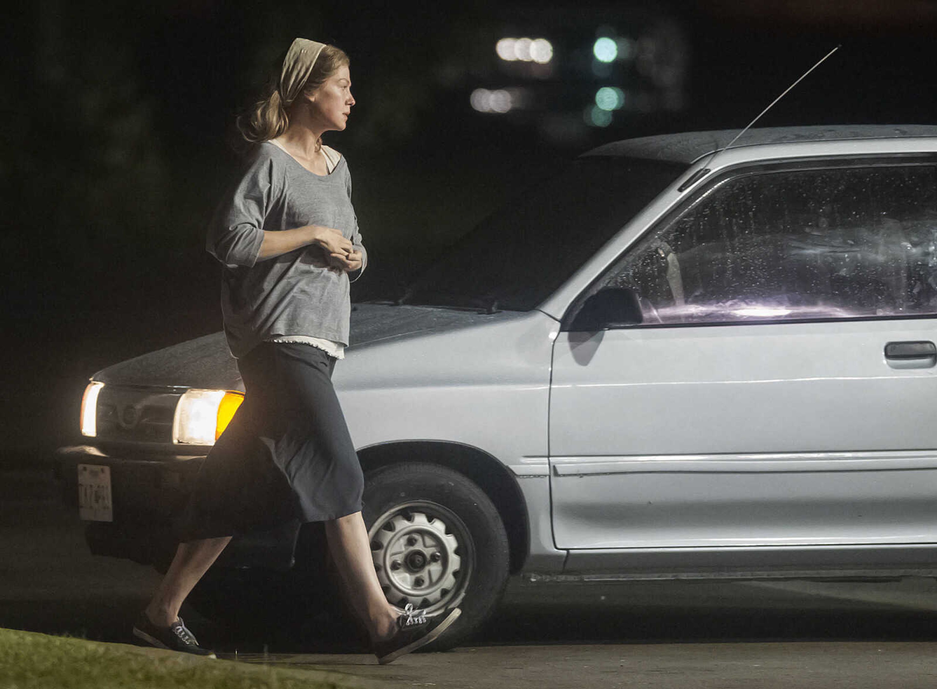 Rosamund Pike plays the role of Amy Dunne in the move "Gone Girl." Here, she is filming a scene in Cape Girardeau on Sept. 20, 2013. Pike has said in interviews she gained 12 pounds for the role as her character's weight fluctuates dramatically in the story. Southeast Missourian file