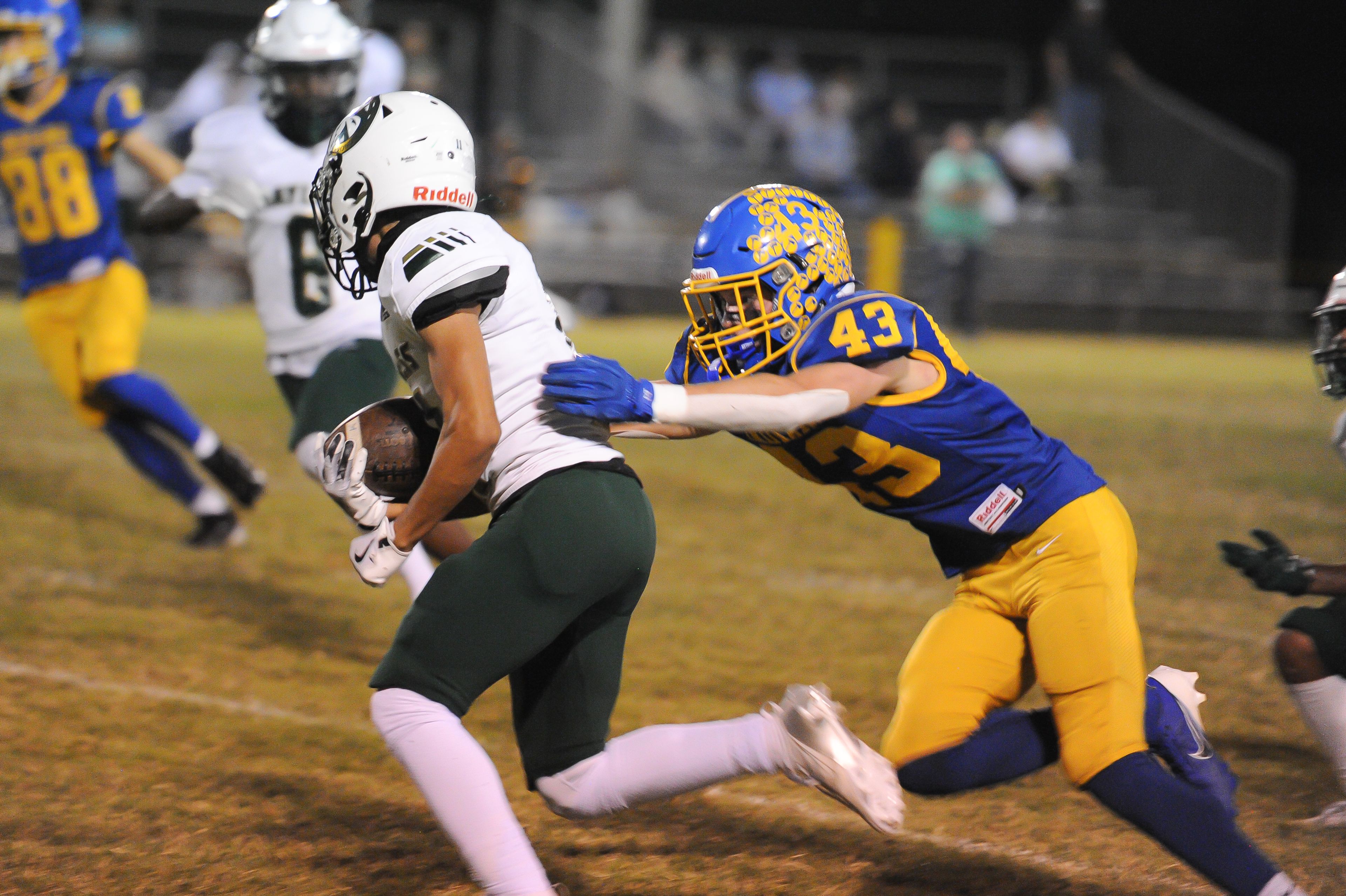 St. Vincent's Carson House (right) wraps up the runner during a Friday, October 4, 2024 game between the St. Vincent Indians and the Bayless Bronchos at St. Vincent High School in Perryville, Mo. St. Vincent defeated Bayless, 56-21.