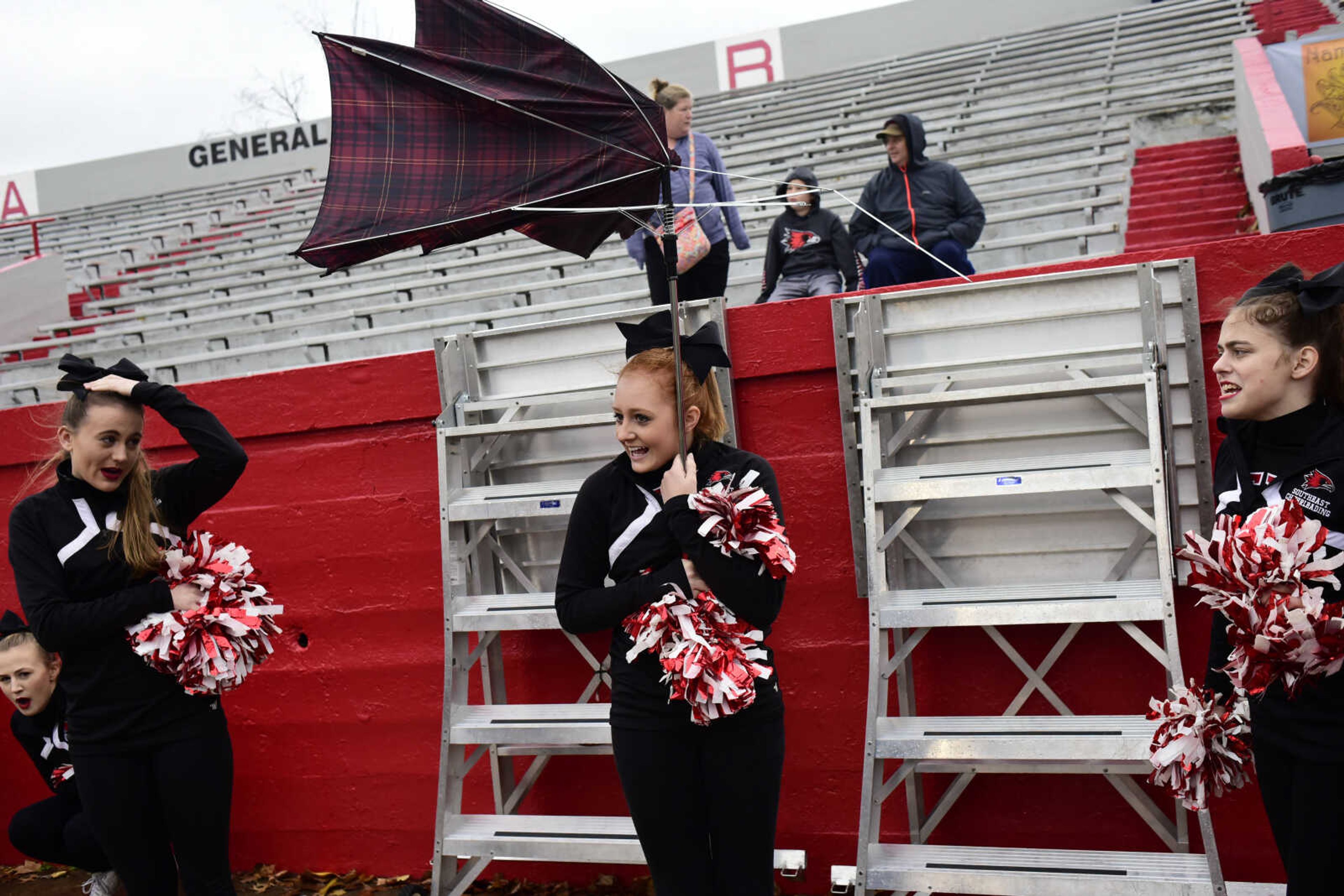 Taylor Maness' umbrella is turned inside out from the wind during a game between Southeast Missouri and Murray State Saturday, Nov. 18, 2017 at Houck Field in Cape Girardeau. Semo won 21-10.