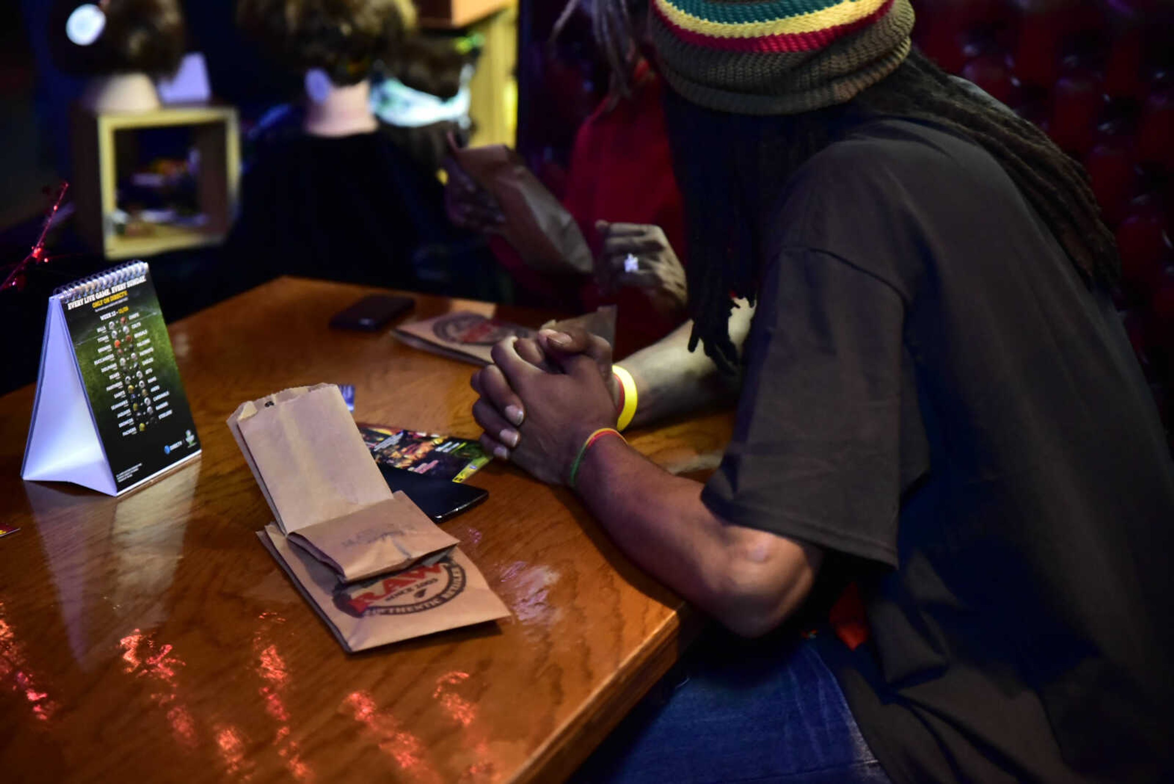 Brandon Evans wears rubber bracelets for the festivities of the 3rd annual Bob Marley Day celebration held at Ragsdales in downtown Cape Girardeau Feb. 10, 2018.