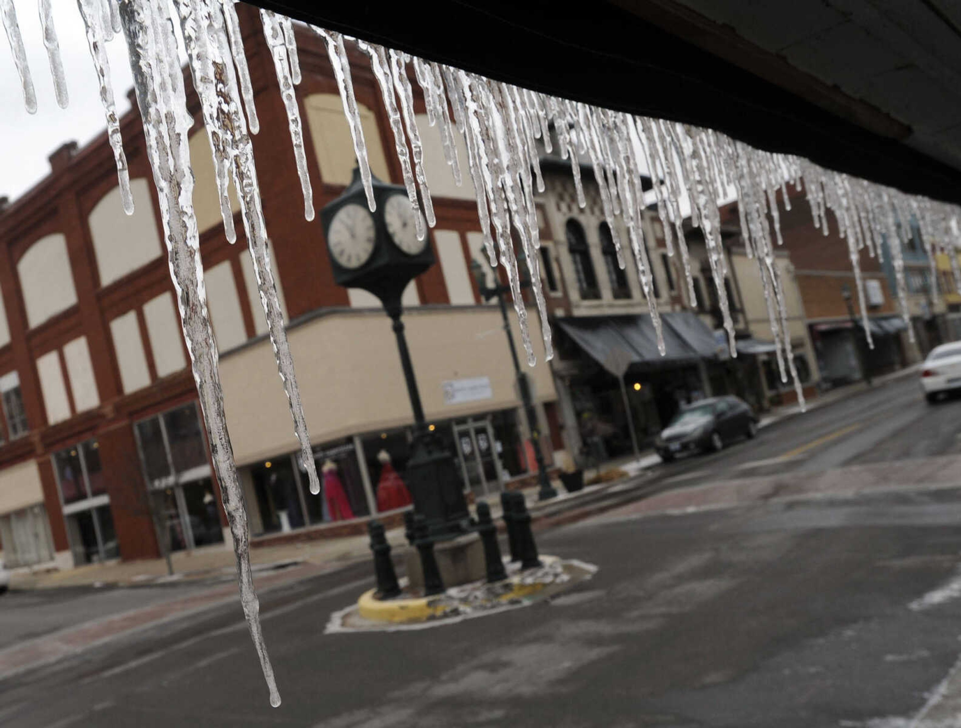 FRED LYNCH ~ flynch@semissourian.com
Icicles hang from an awning at Cup 'N' Cork at Main and Themis streets on Sunday, March 2, 2014 in downtown Cape Girardeau.