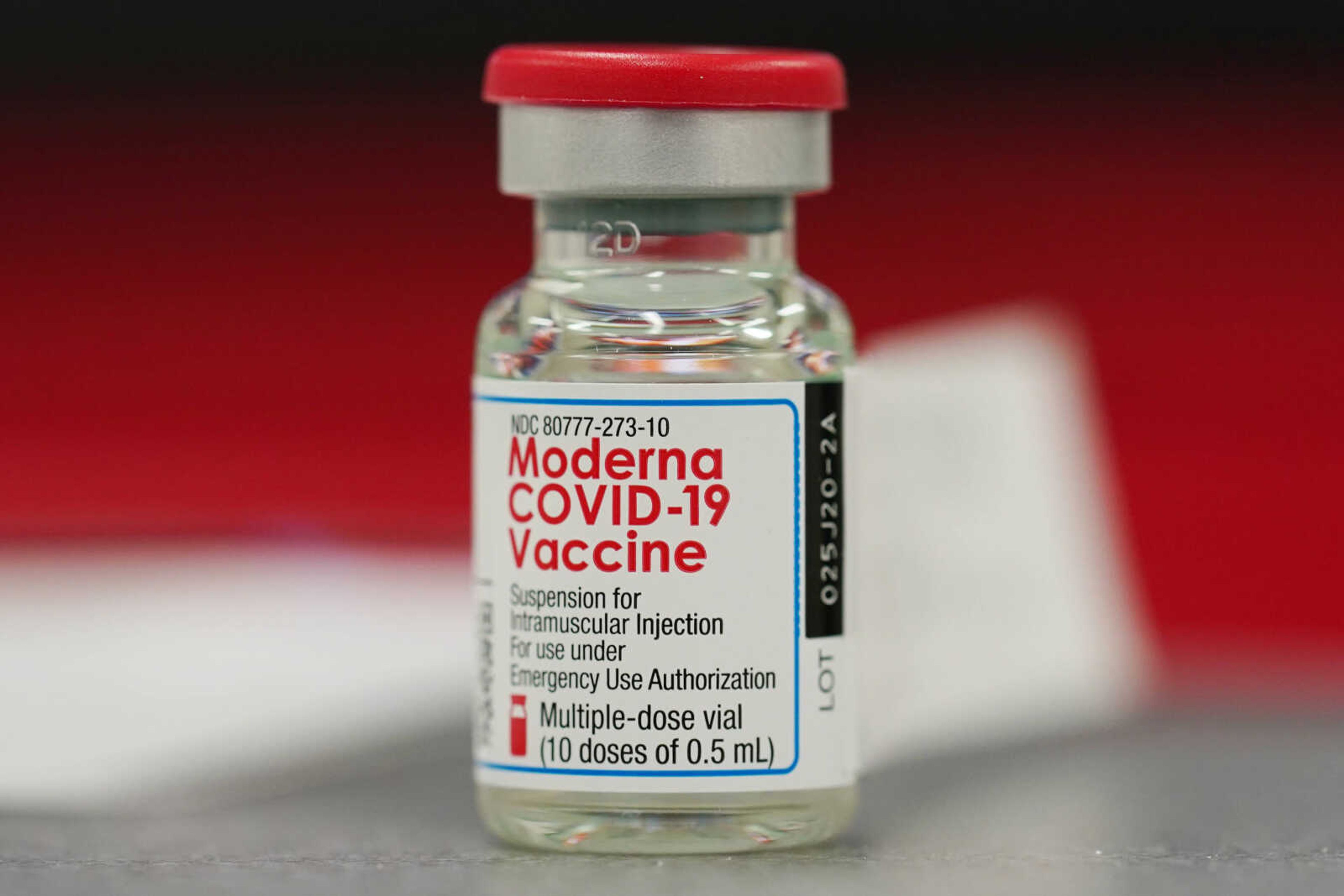 A vial of the Moderna COVID-19 vaccine Dec. 23, 2020, at a hospital in Denver.