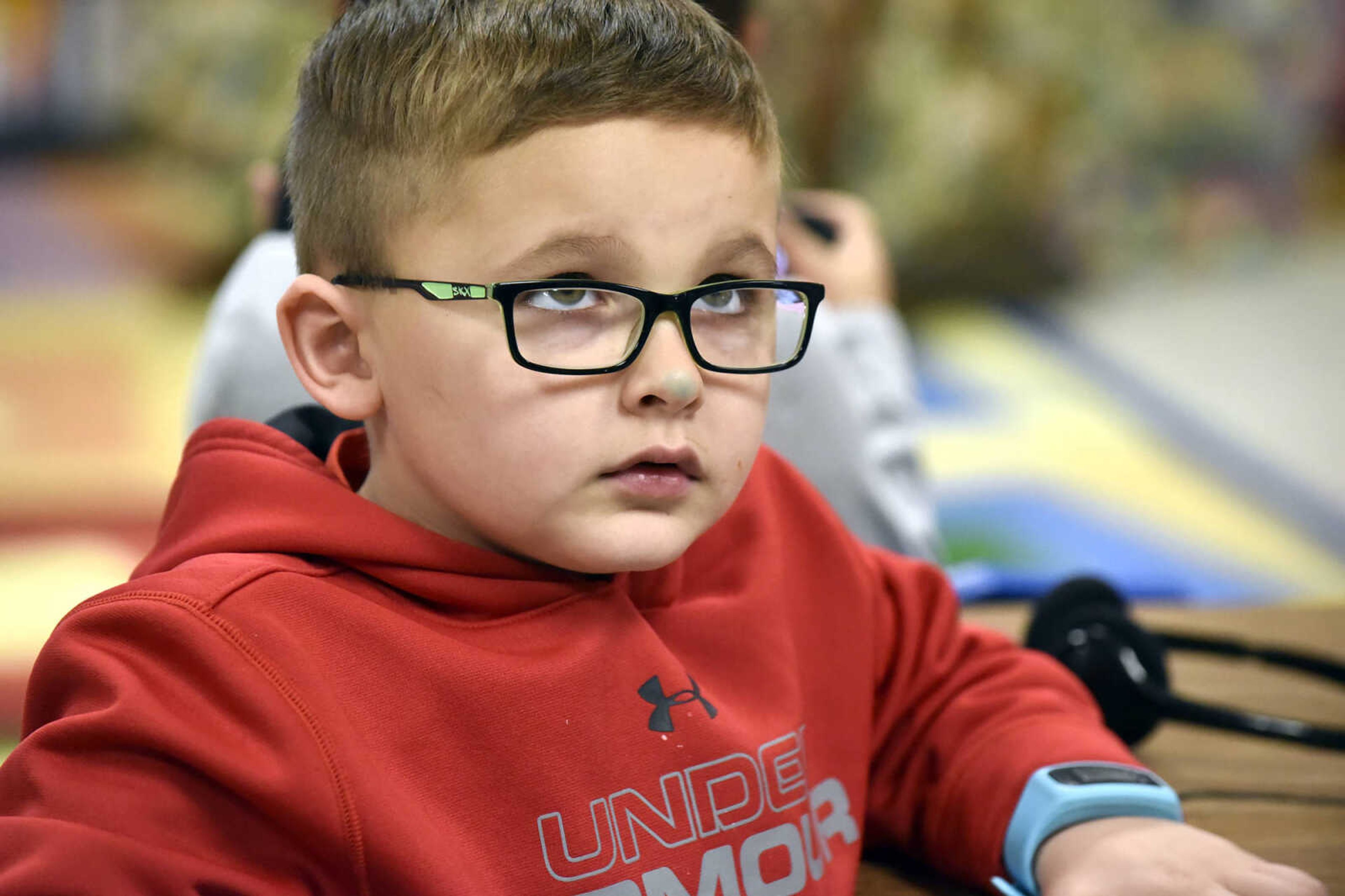 Koby Hayman listens to his teacher on Friday, Jan. 6, 2016, in Jennie Pehle's kindergarten class at Orchard Drive Elementary in Jackson.