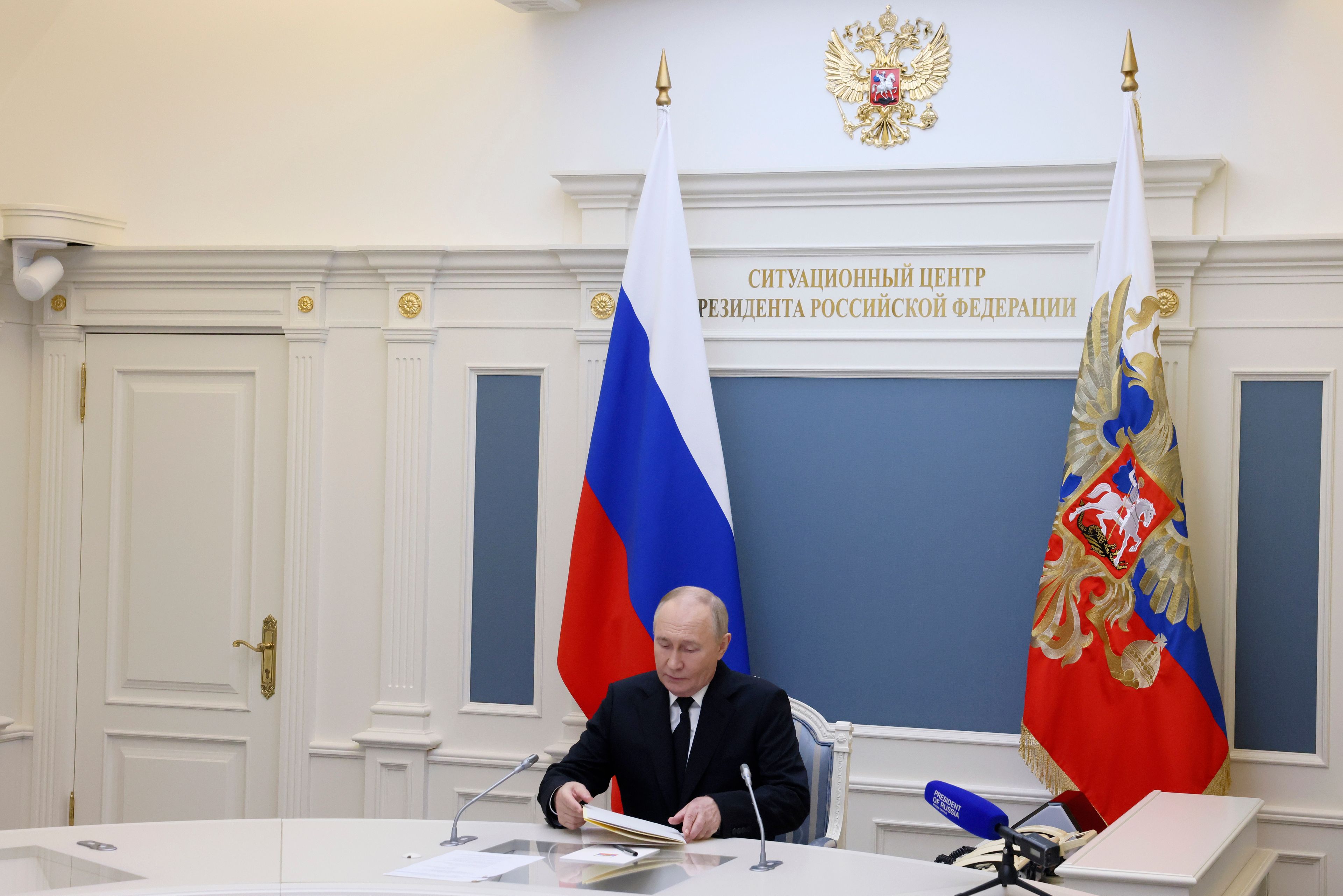 Russian President Vladimir Putin takes part in an exercise of Russia's strategic nuclear deterrence forces to train actions of officials on operating nuclear weapons with practical launches of ballistic and cruise missiles, at the Kremlin in Moscow, Russia, Tuesday, Oct. 29, 2024. (Mikhail Metzel, Sputnik, Kremlin Pool Photo via AP)