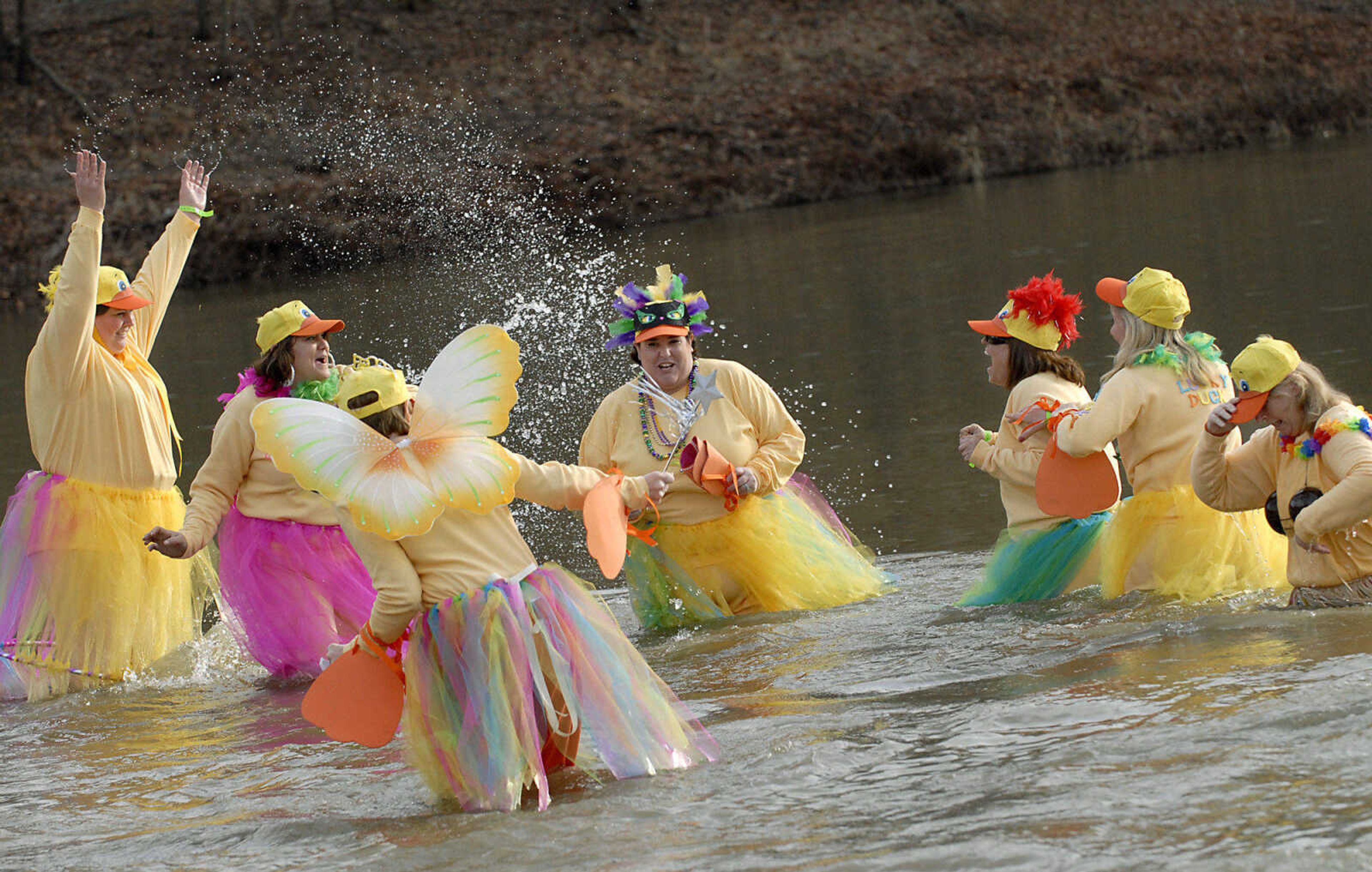 KRISTIN EBERTS ~ keberts@semissourian.com

The Rubber Duckies team makes a splash during the 2012 Polar Plunge at the Trail of Tears State Park's Lake Boutin on Saturday, Feb. 4, 2012.