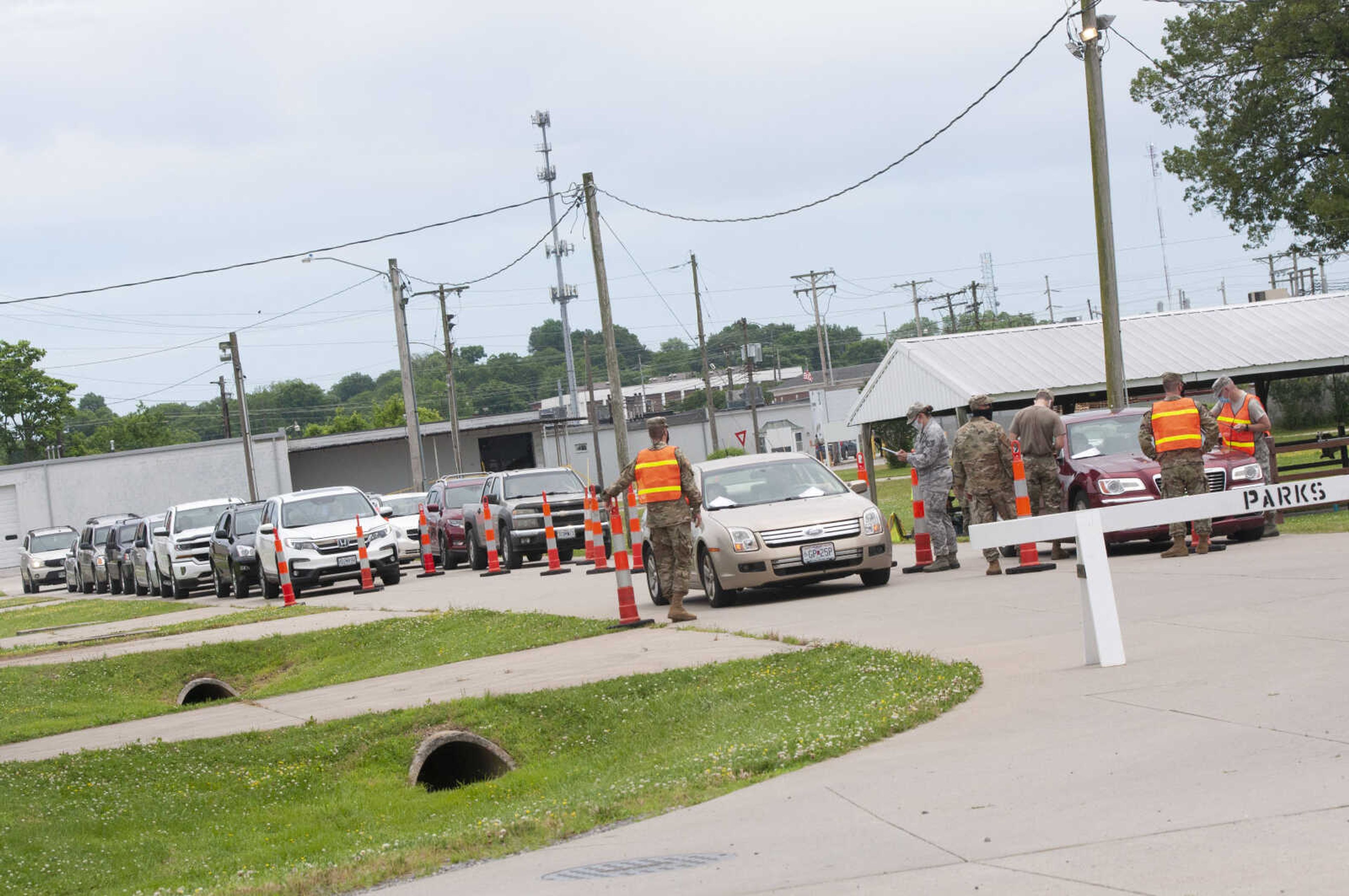 Vehicles wait in line during free COVID-19 testing Friday, June 5, 2020, at Arena Park in Cape Girardeau. The drive-up testing event was scheduled for 7 a.m. to 7 p.m.