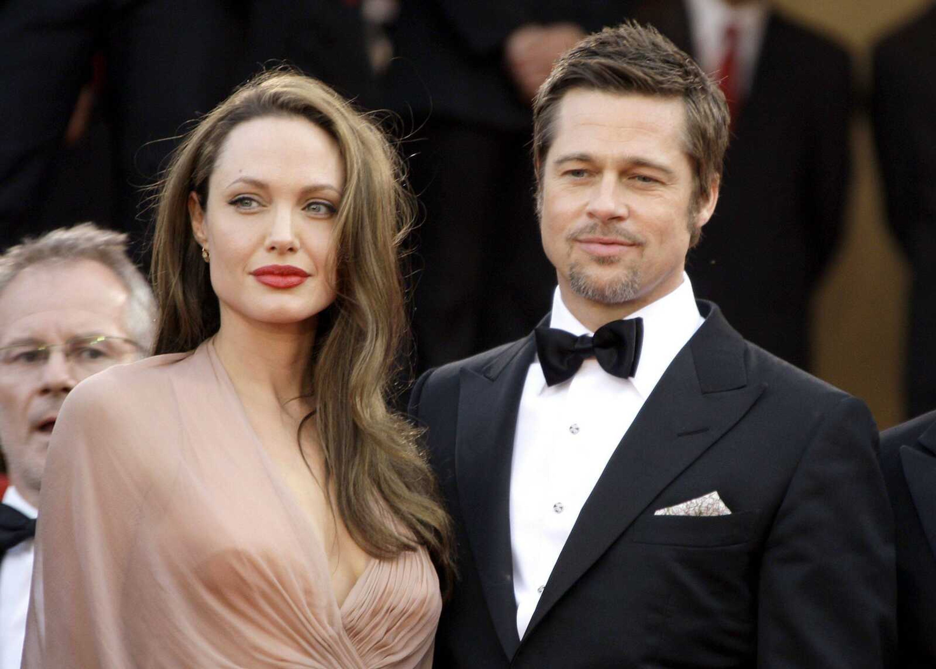 FILE - In this May 20, 2009 file photo, American actors Brad Pitt and Angelina Jolie arrive on the red carpet for the film "Inglourious Basterds", during the 62nd International film festival in Cannes, southern France. (AP Photo/Francois Mori, file)