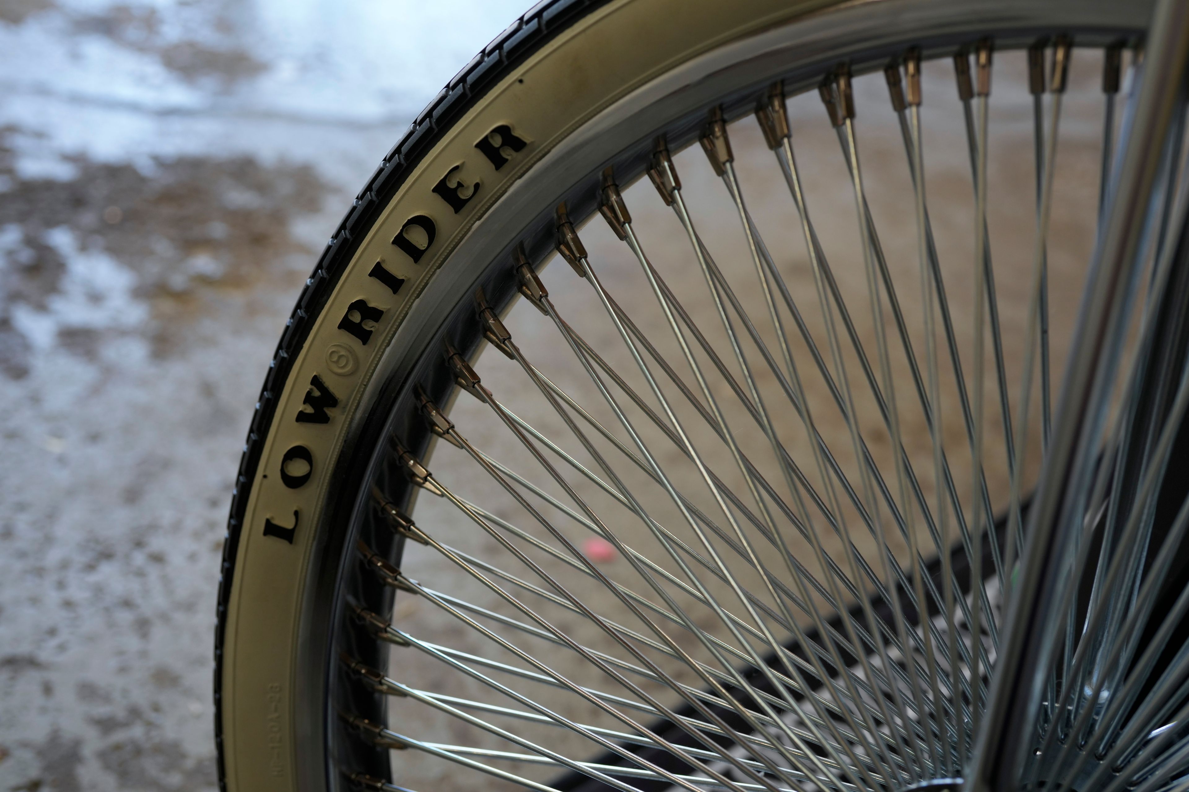 A detail of 7-year-old Daniel Marquez's chrome lowrider bike, built by Daniel and family friends in memory of his late father Alberto, a longtime member of lowrider car clubs, can be seen Saturday, Sept. 14, 2024, at his home in Frankfort, Ill. (AP Photo/Erin Hooley)