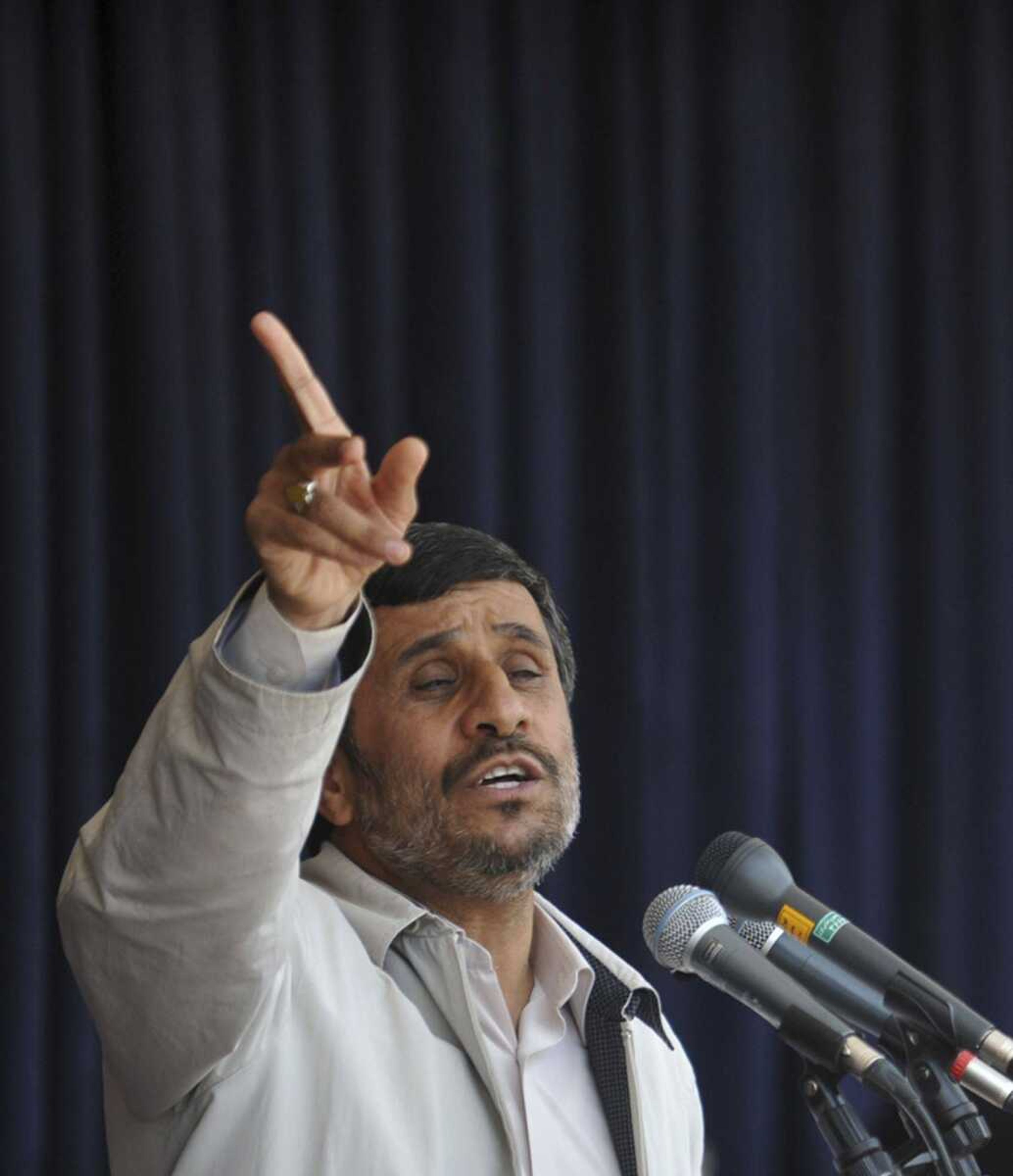 Iranian President Mahmoud Ahmadinejad gestures Wednesday while speaking during a public gathering at the city of Shahr-e-Kord, 325 miles south of the capital Tehran. (SAJJAD SAFARI ~ Associated Press/IIPA)