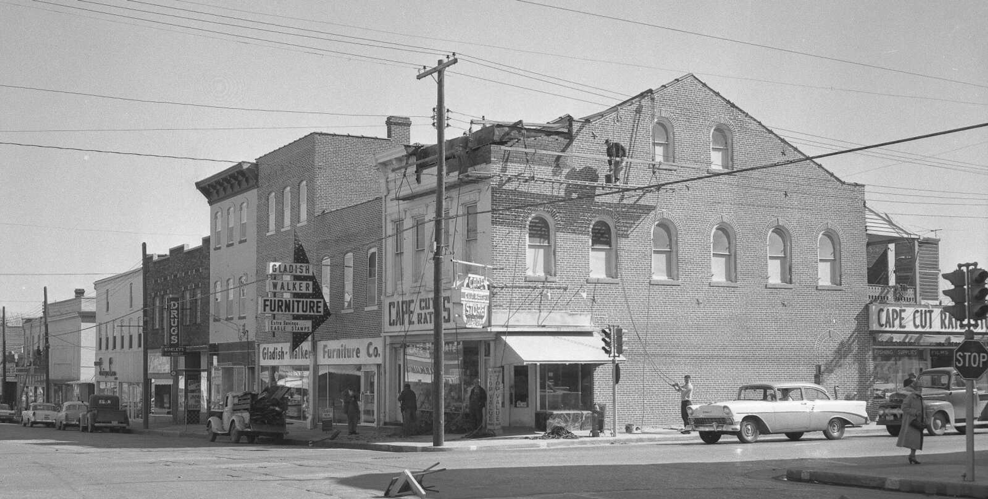 Renovations to several buildings on Good Hope Street were underway in March 1961. Here workers remodeled the Cape Cut Rate Drug Store at Good Hope and Sprigg streets, giving it "a more modern look." (Missourian photograph by G.D. "Frony" Fronabarger)