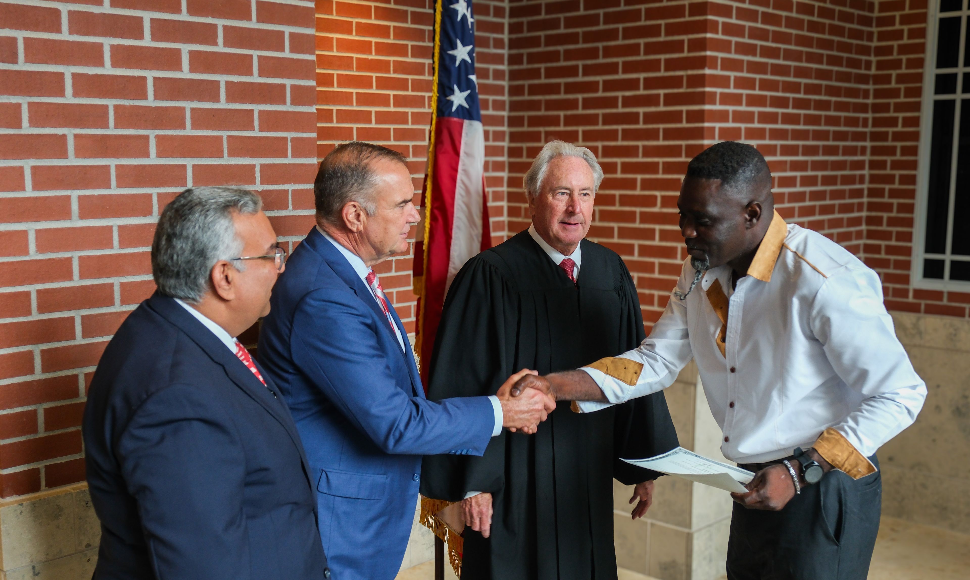 Gov. Kehoe, Treasurer Malek welcome new US citizens at naturalization ceremony in Cape