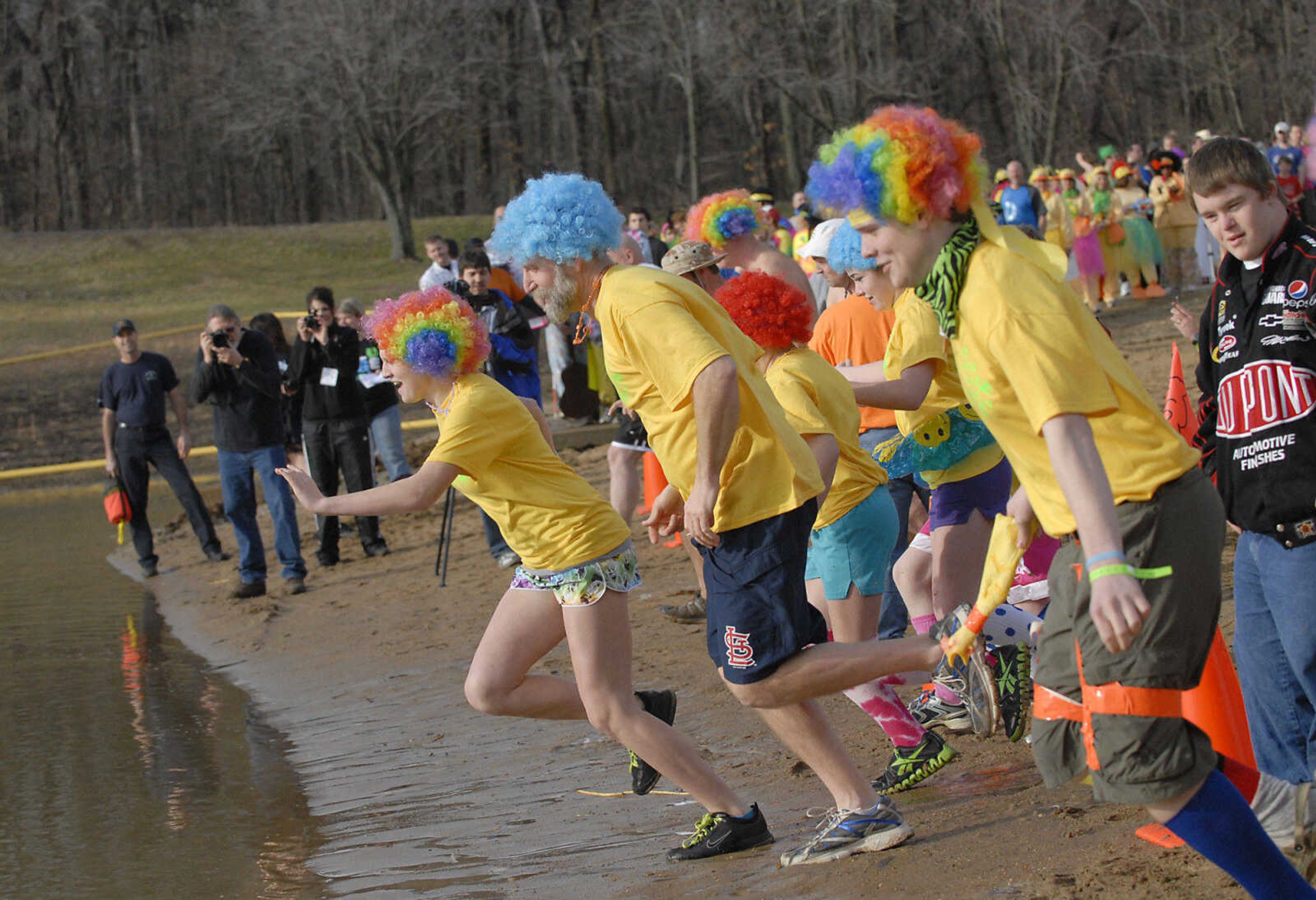 KRISTIN EBERTS ~ keberts@semissourian.com

Plungers brave the water during the 2012 Polar Plunge at the Trail of Tears State Park's Lake Boutin on Saturday, Feb. 4, 2012.